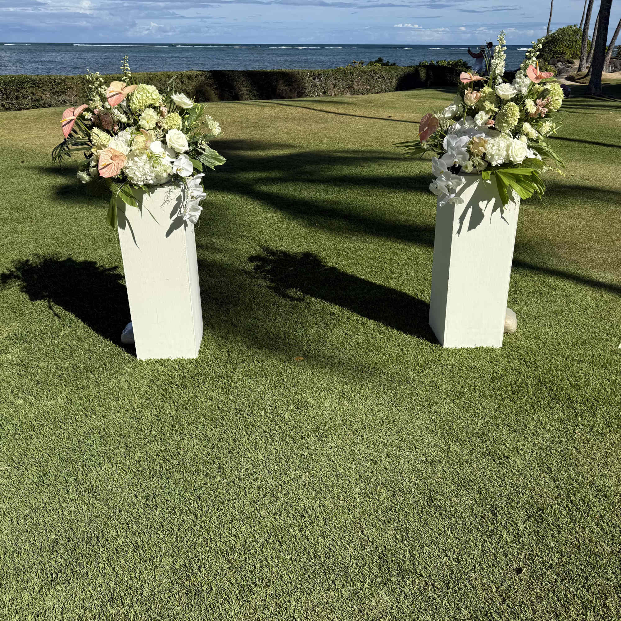Pedestals rentals are $50 each. Large in season green and white floral, photo 2 of 3