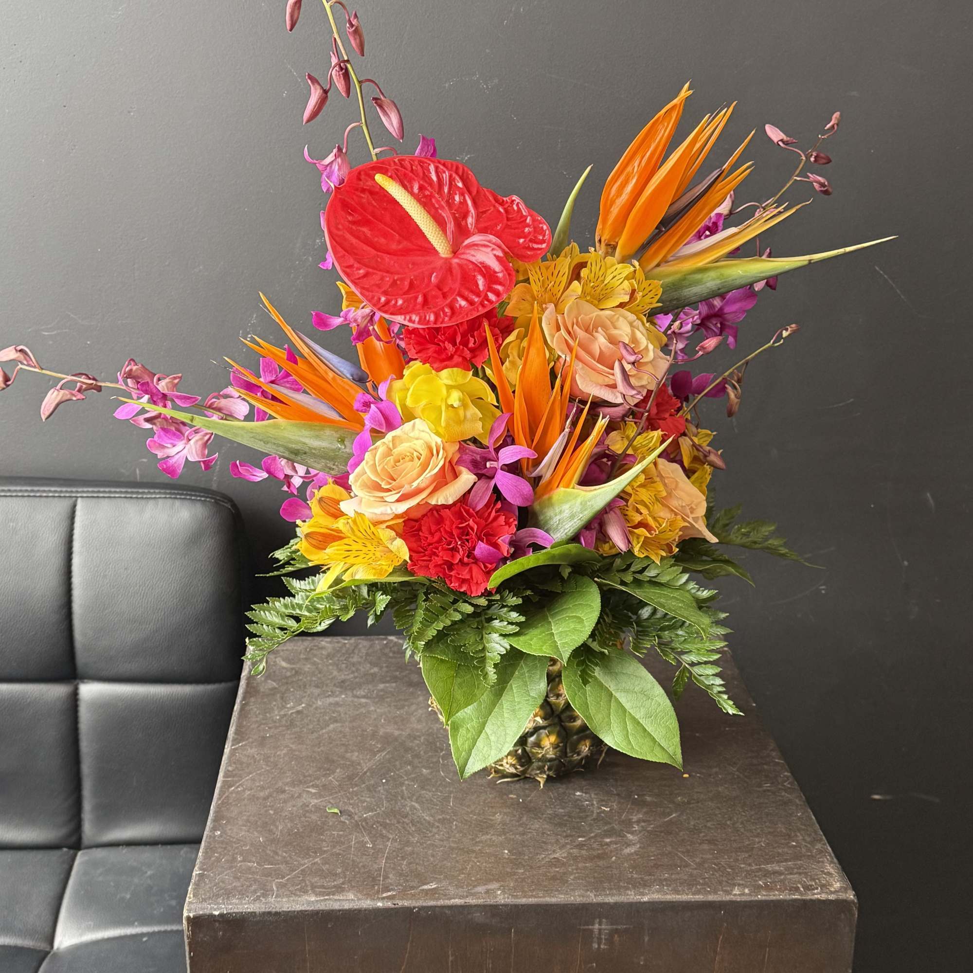 Luxury Line Floral with in season local tropicals in a fresh pineapple