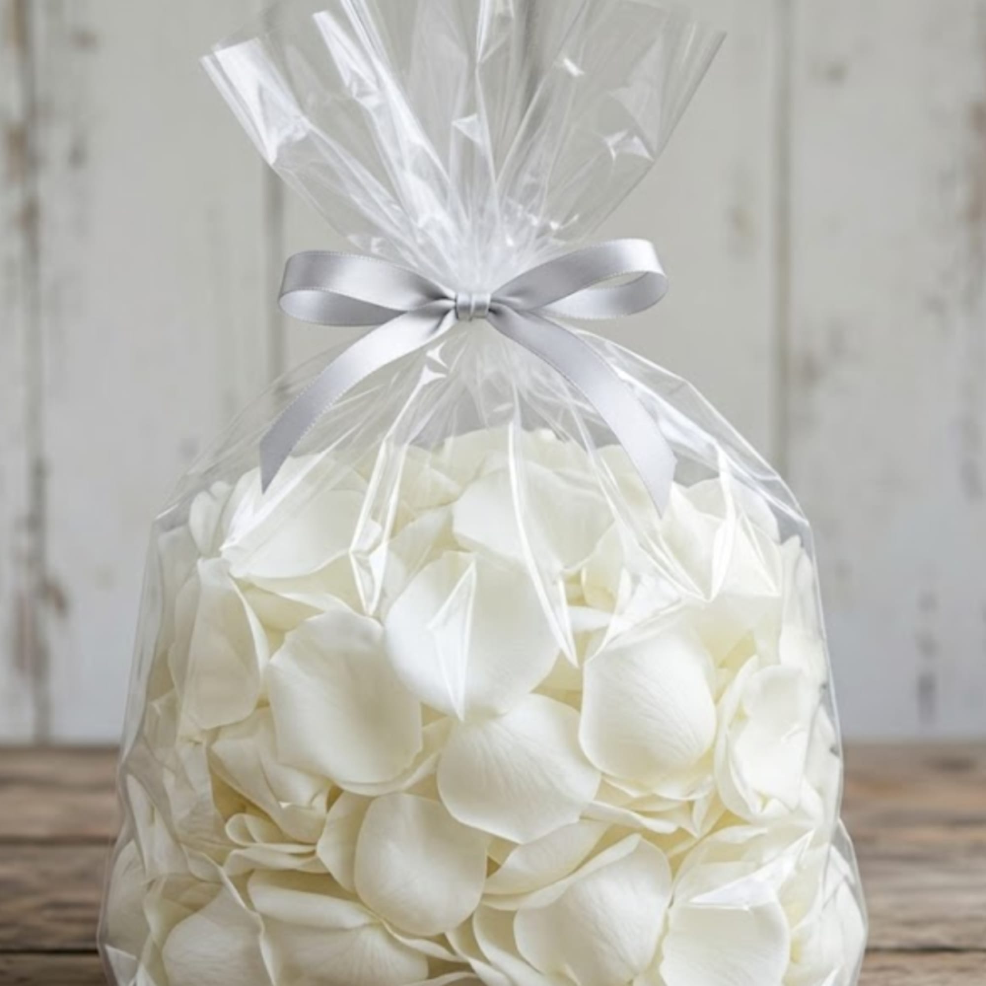 Flower petals add a romantic, polished finishing touch to an aisleway, entrance