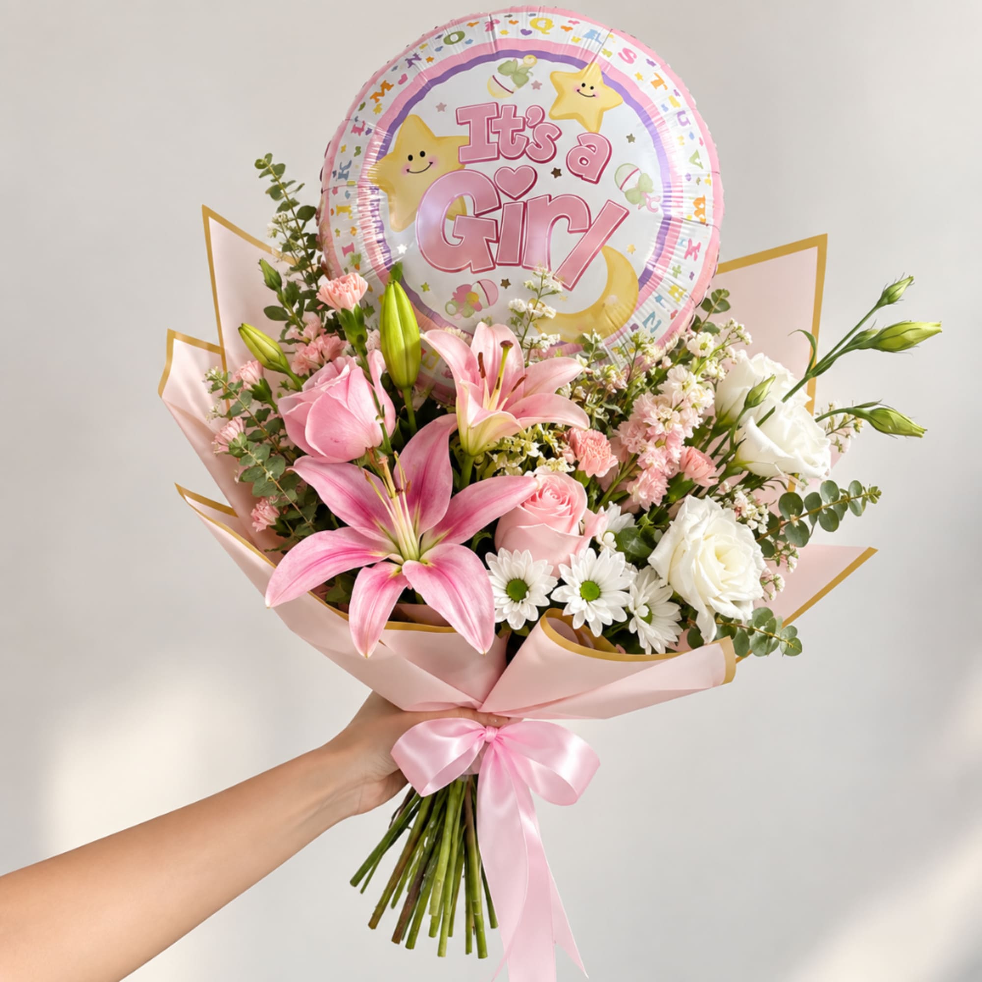 Pink and white bouquet with a "It's a Girl" balloon