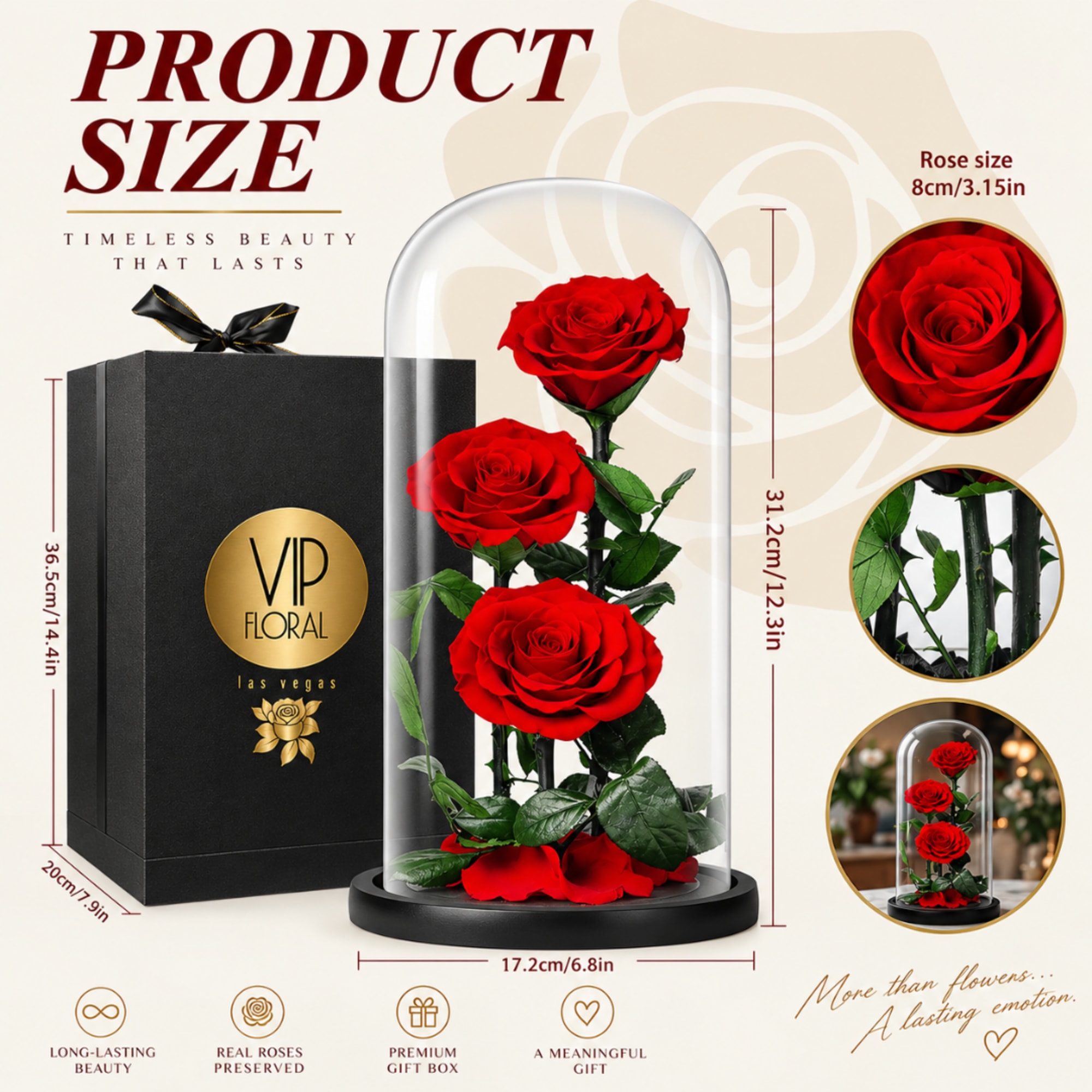 Three red roses under a glass dome with a black gift box.