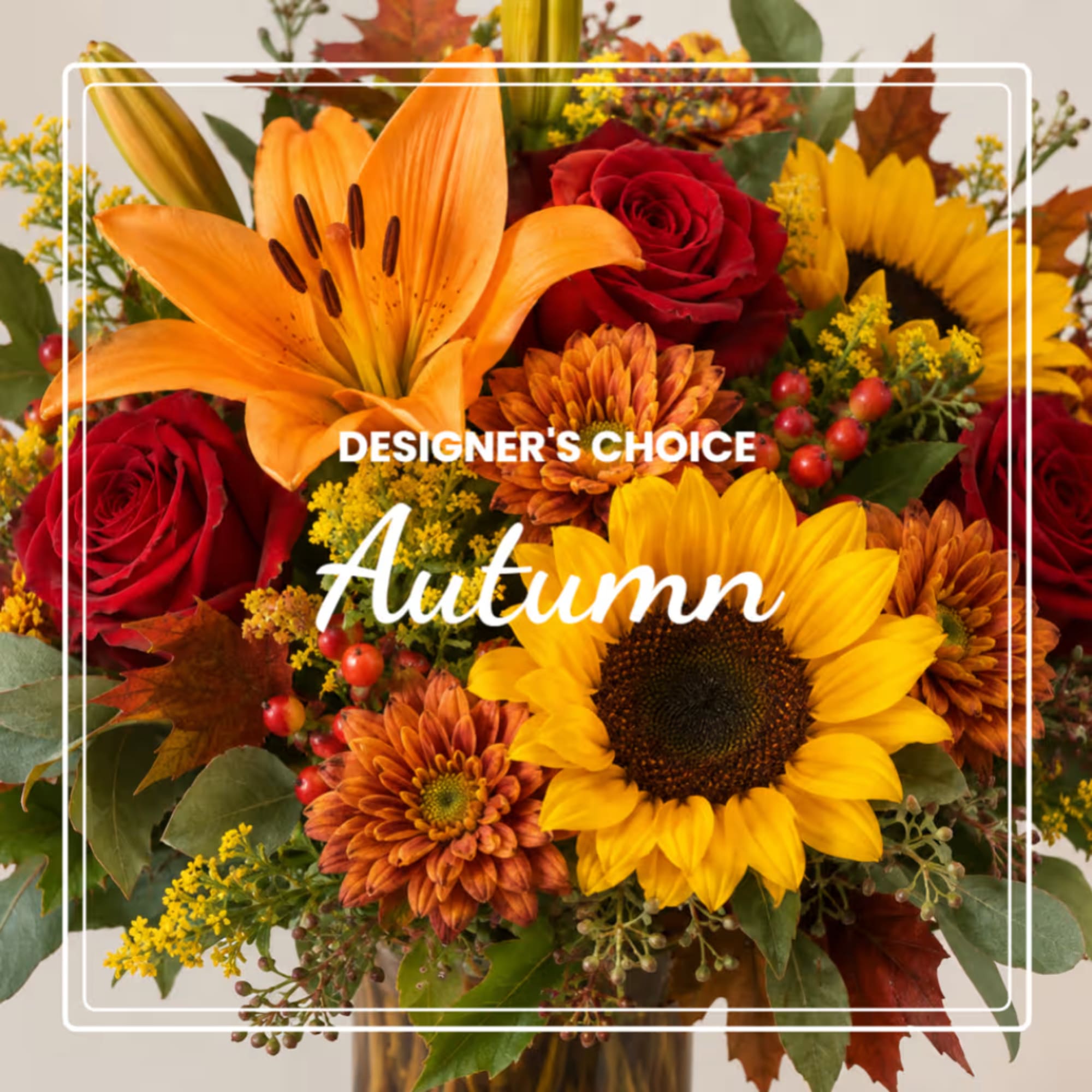Autumn bouquet with sunflowers, red roses, and orange lilies