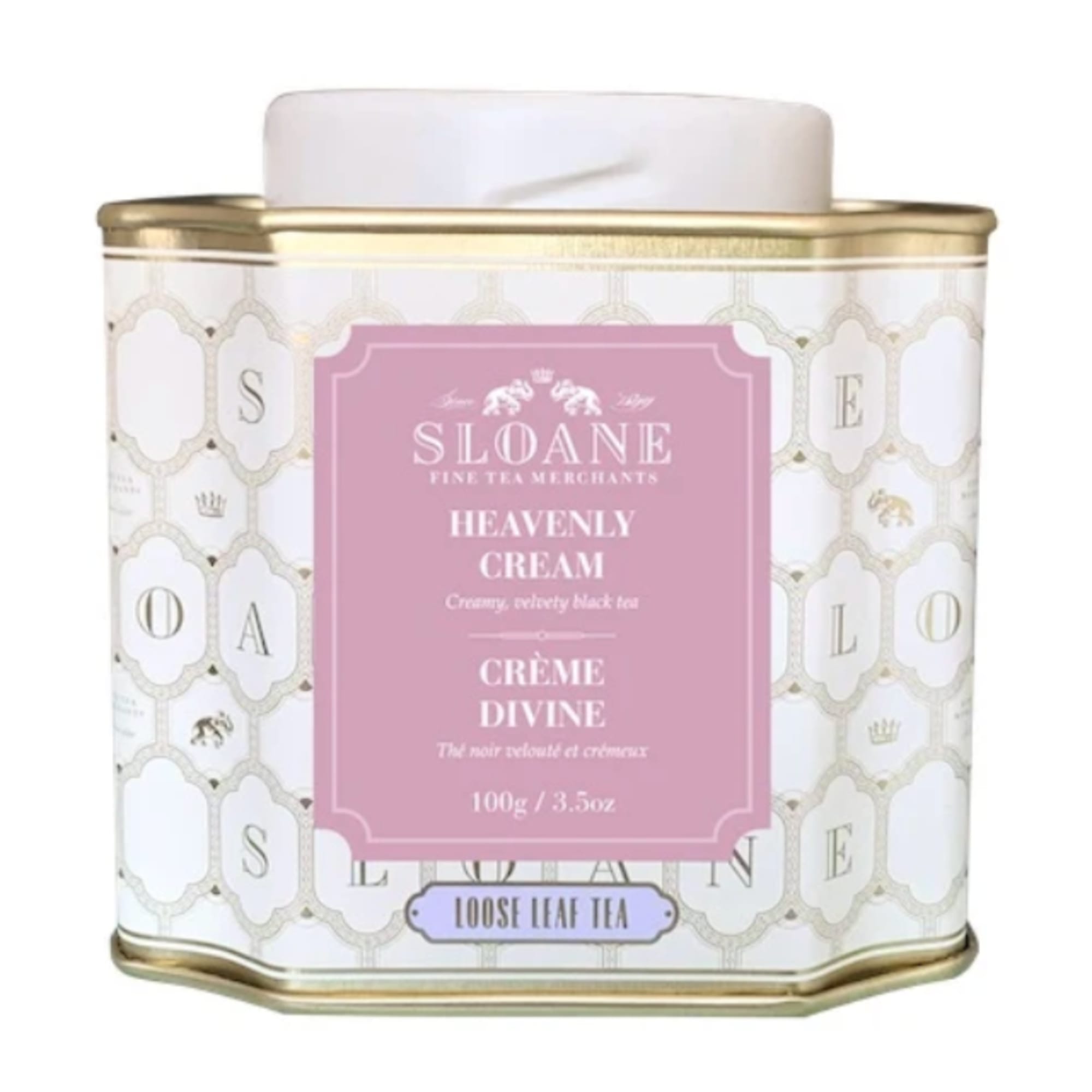 Decorative tin of loose leaf tea with a pink label and gold trim