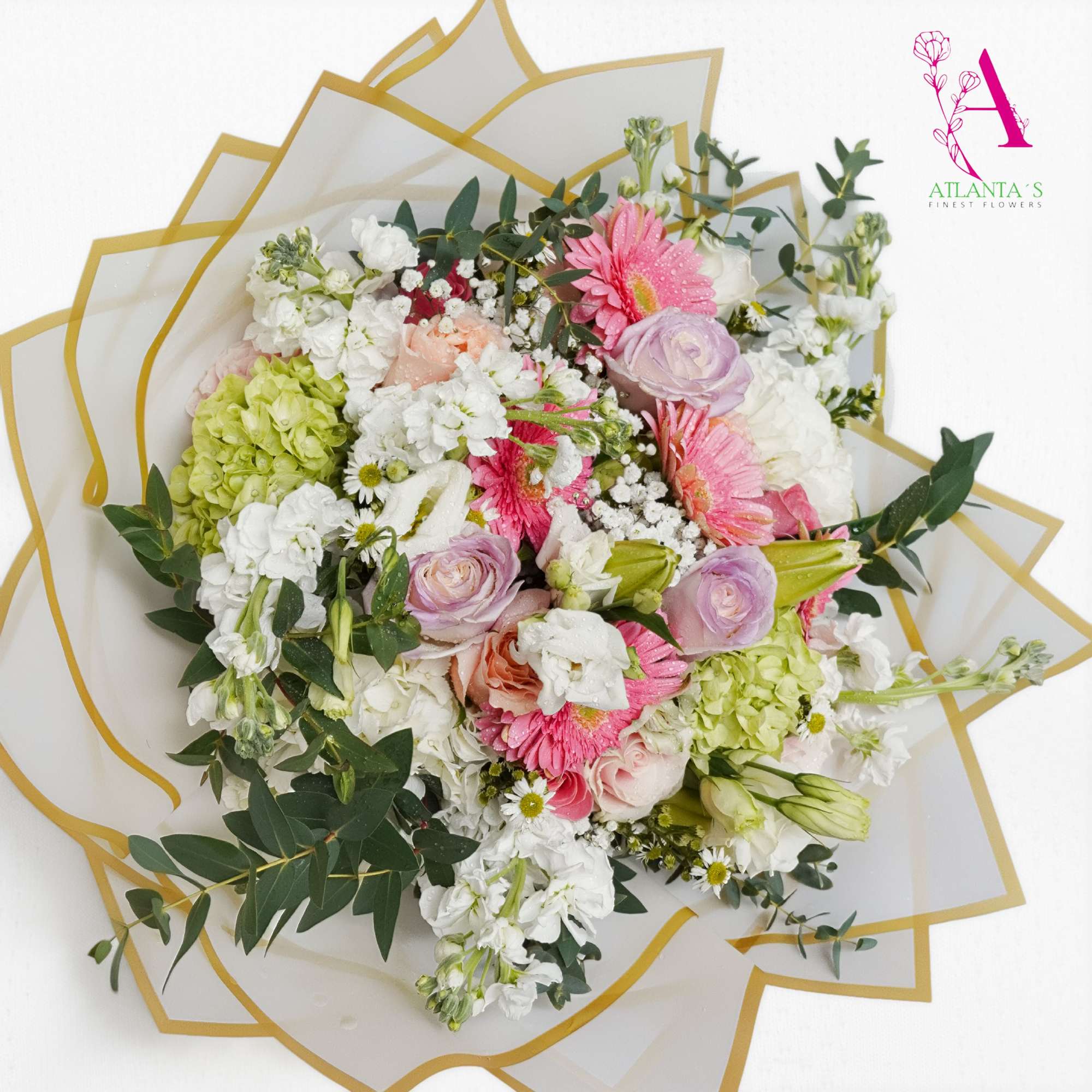 A charming garden-style bouquet featuring soft pink gerbera daisies, pastel roses, lush, photo 2 of 2