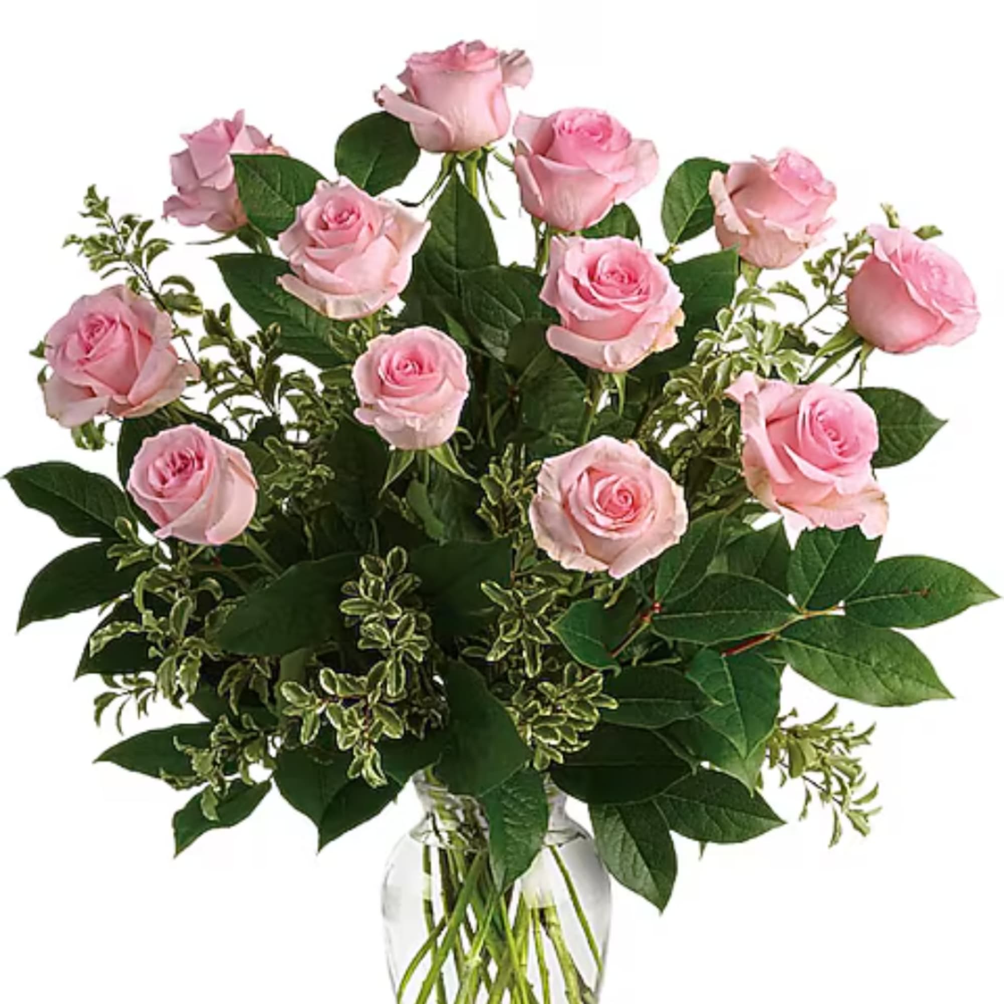 Pink roses arranged in a clear glass vase