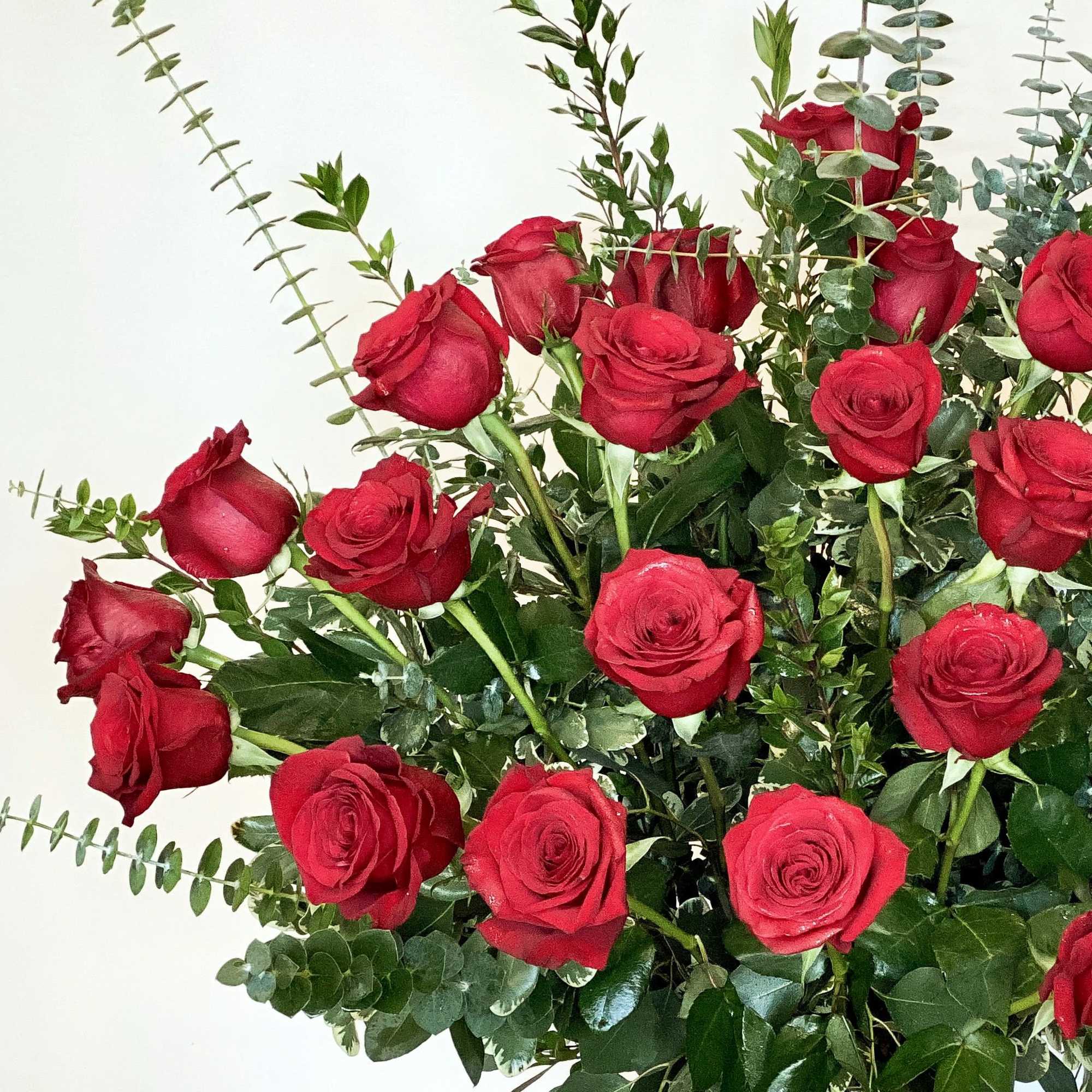 Bouquet of red roses with eucalyptus greenery