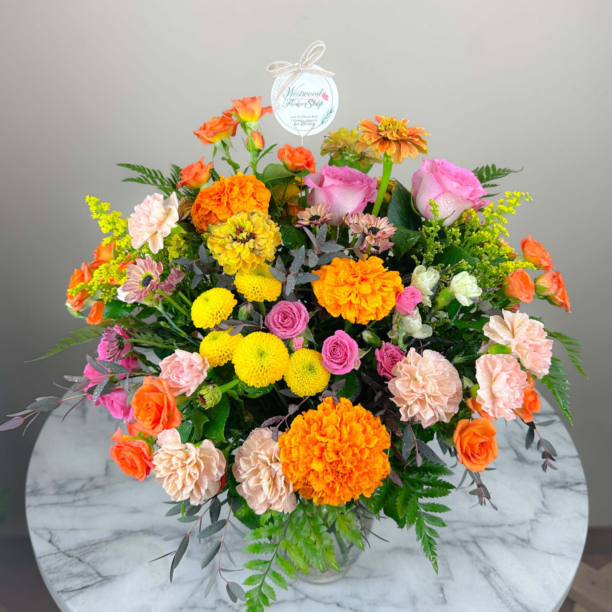 Give the gift of flowers to the celebrant and life of the, photo 2 of 2
