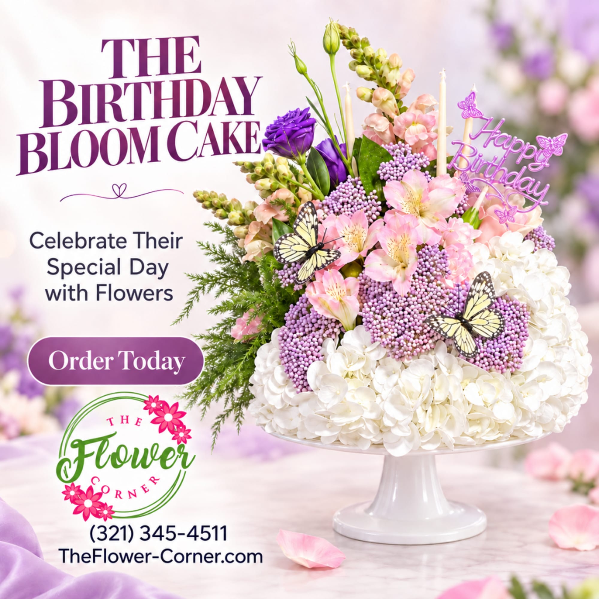 Birthday flower arrangement in a white pedestal vase with purple and pink blooms