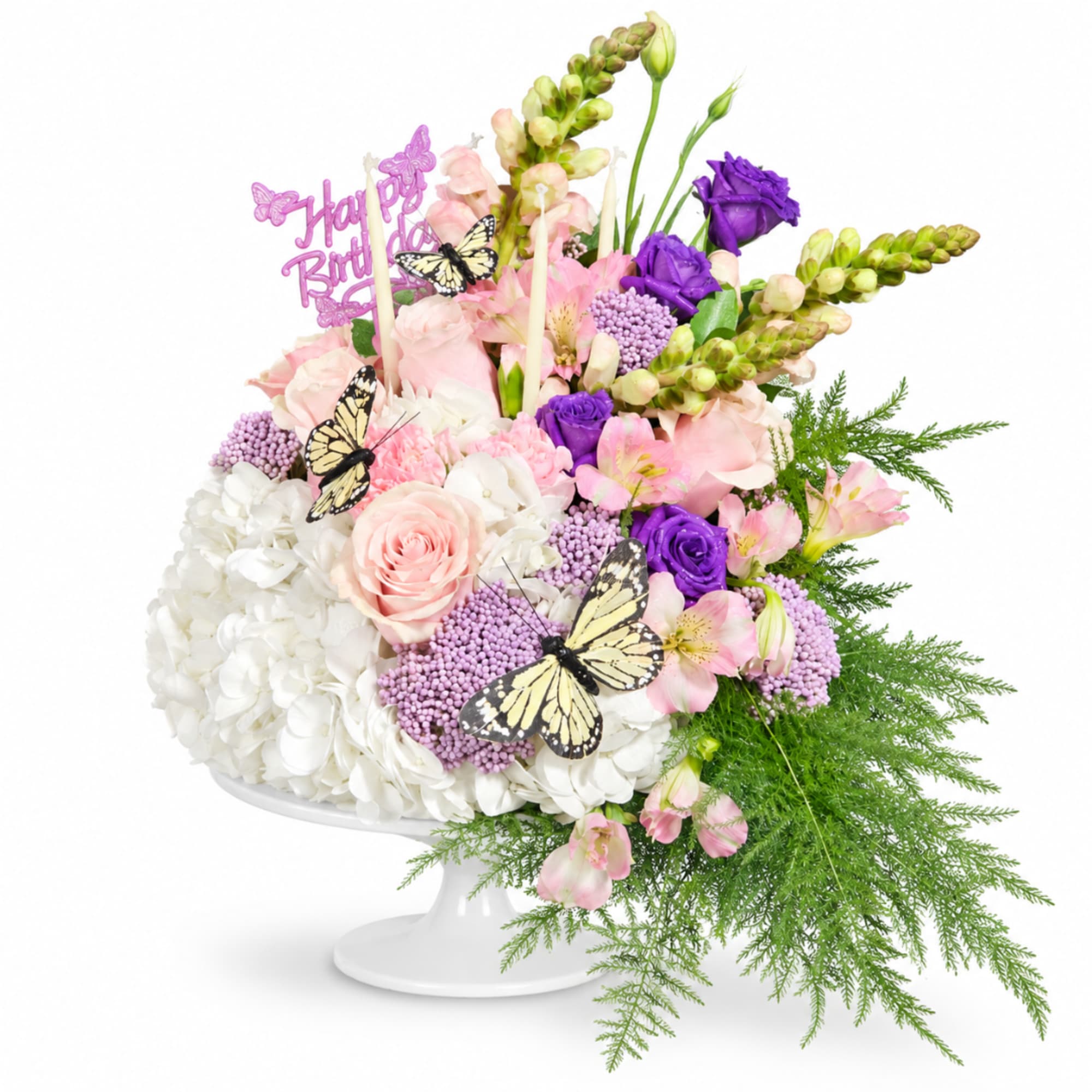 Pink and purple floral arrangement in a white pedestal vase with butterflies