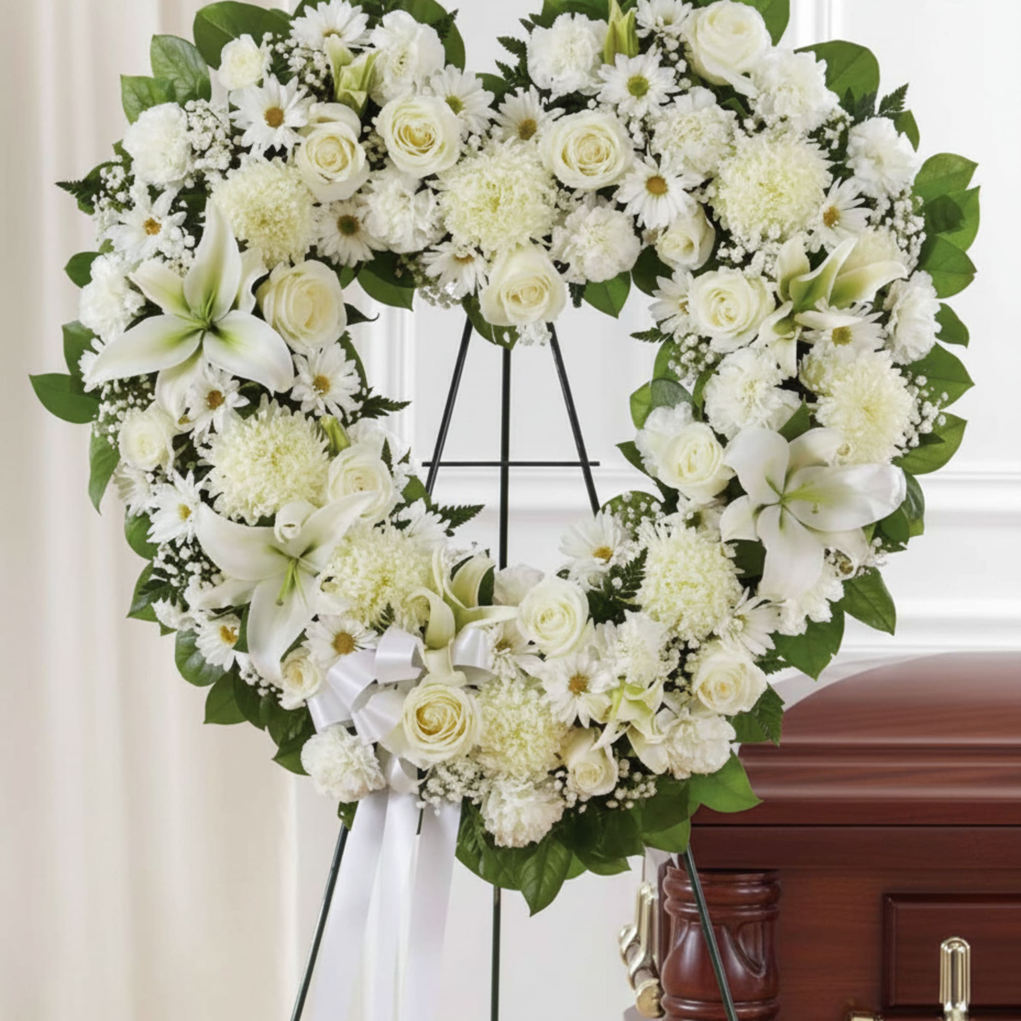 A graceful heart-shaped sympathy wreath that brings calm and reverence to a