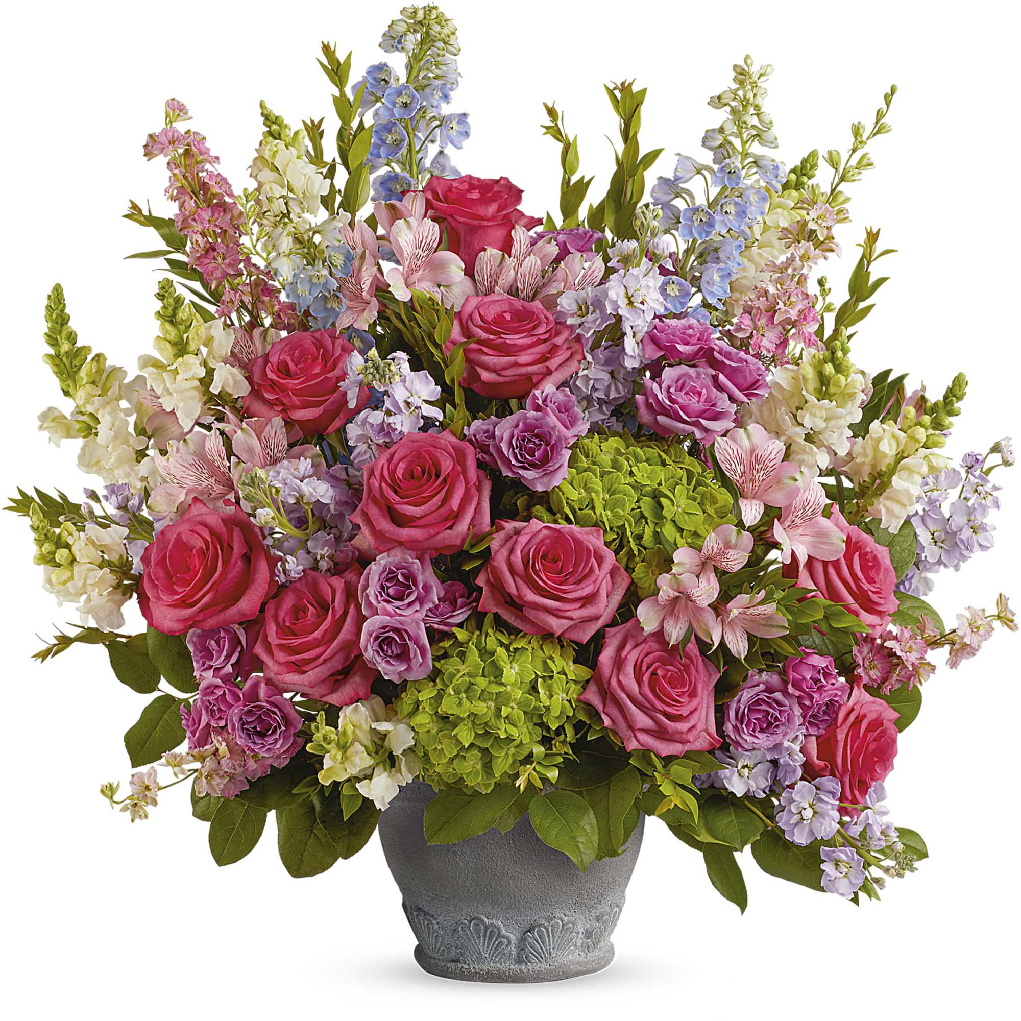 Mixed pink and lavender flower arrangement in a gray vase