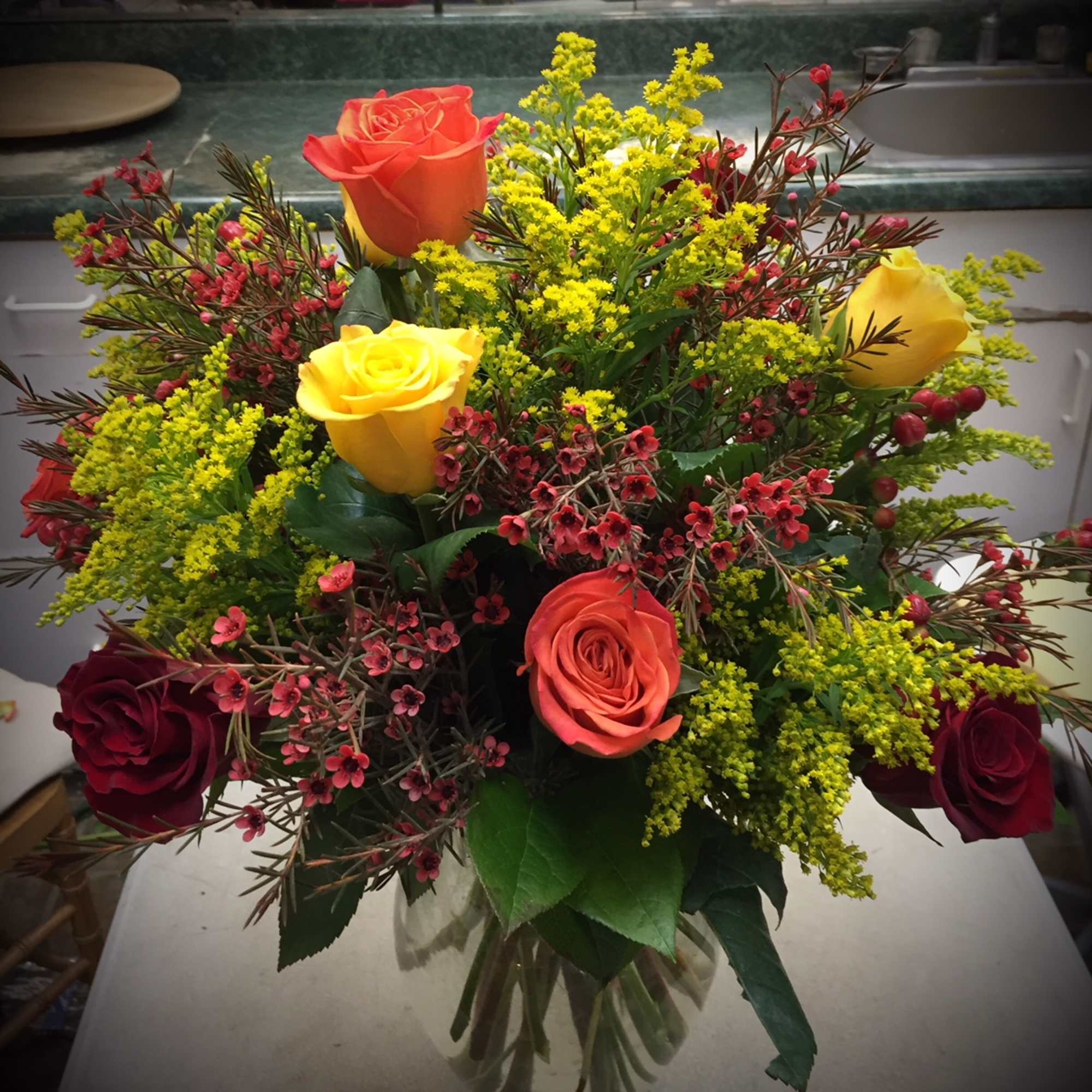 Vase of roses in the colors of fall. Can be one, two
