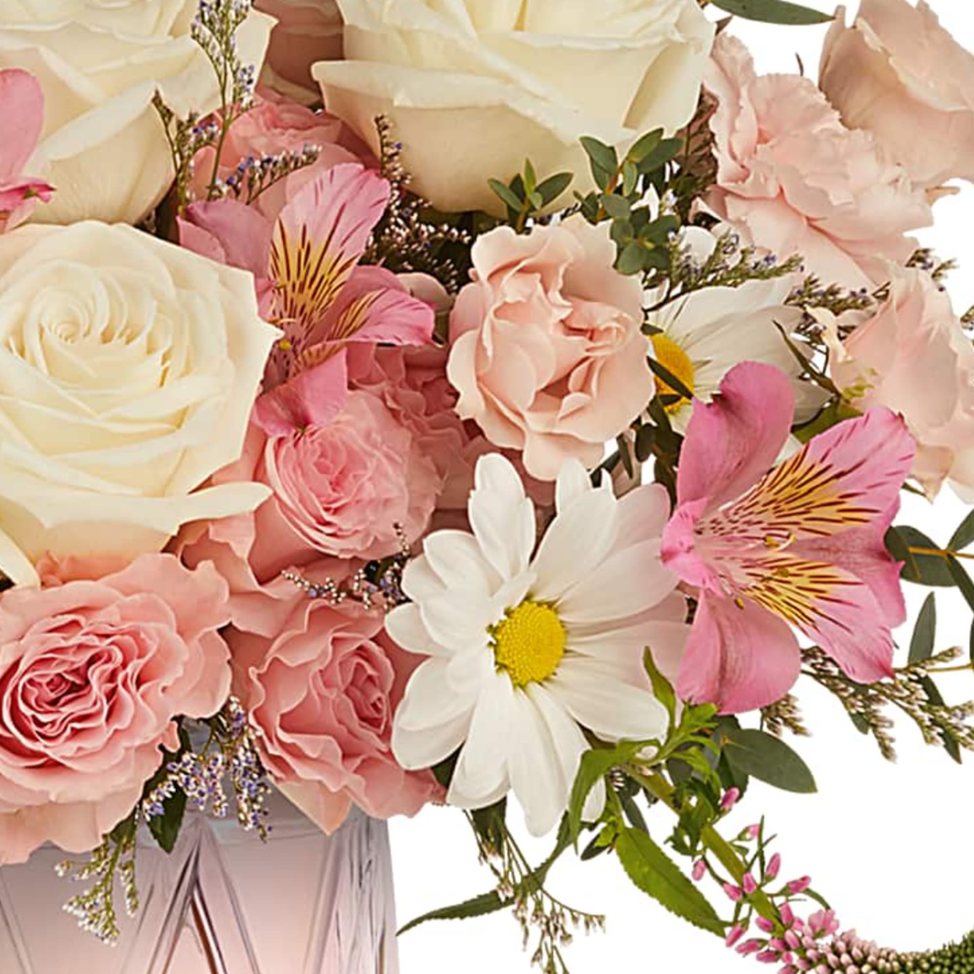 Pink and white mixed bouquet in a glass vase