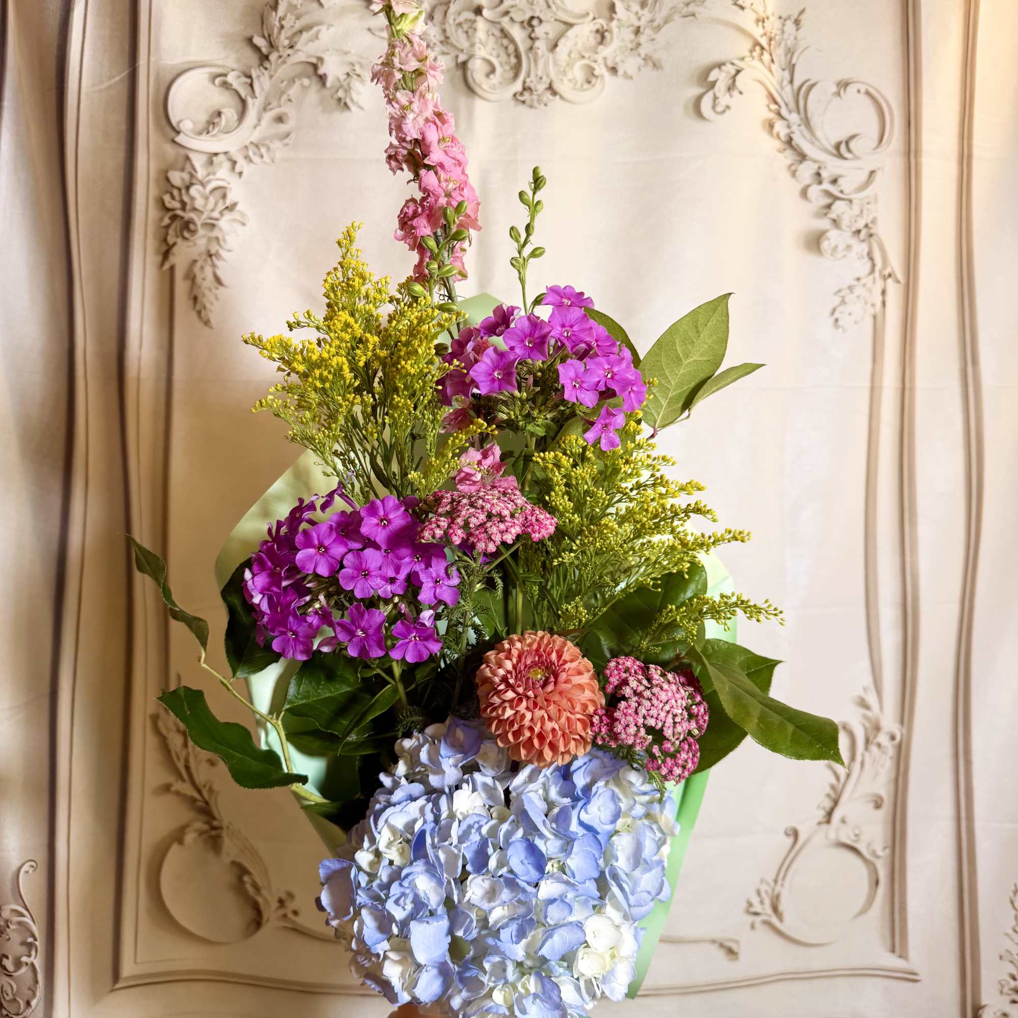 This beautiful wrapped bouquet Is filled with vibrant flowers grown in our, photo 3 of 4