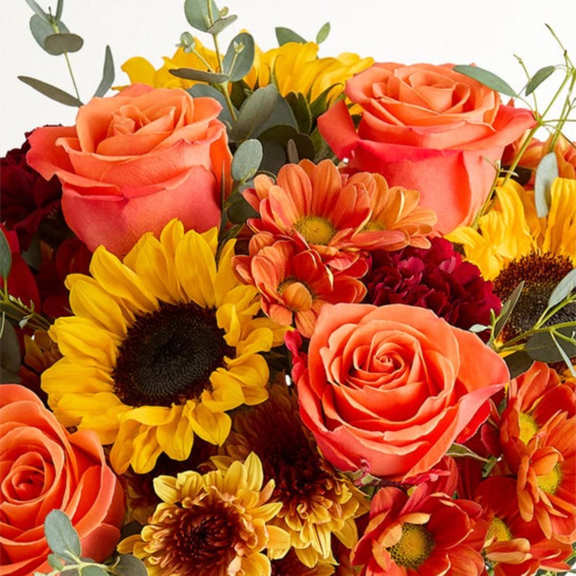 Bouquet of orange roses and yellow sunflowers with eucalyptus