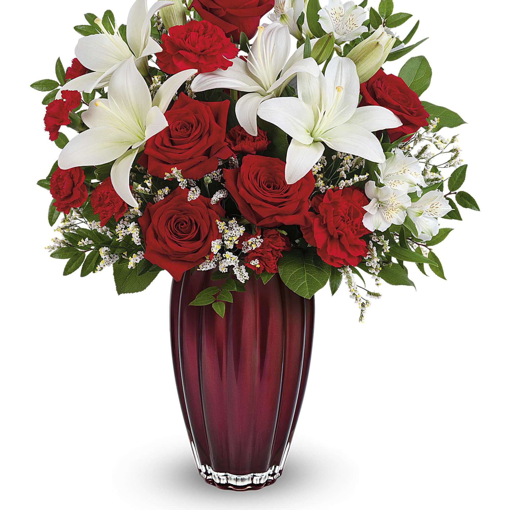 Red roses and white lilies arranged in a burgundy vase