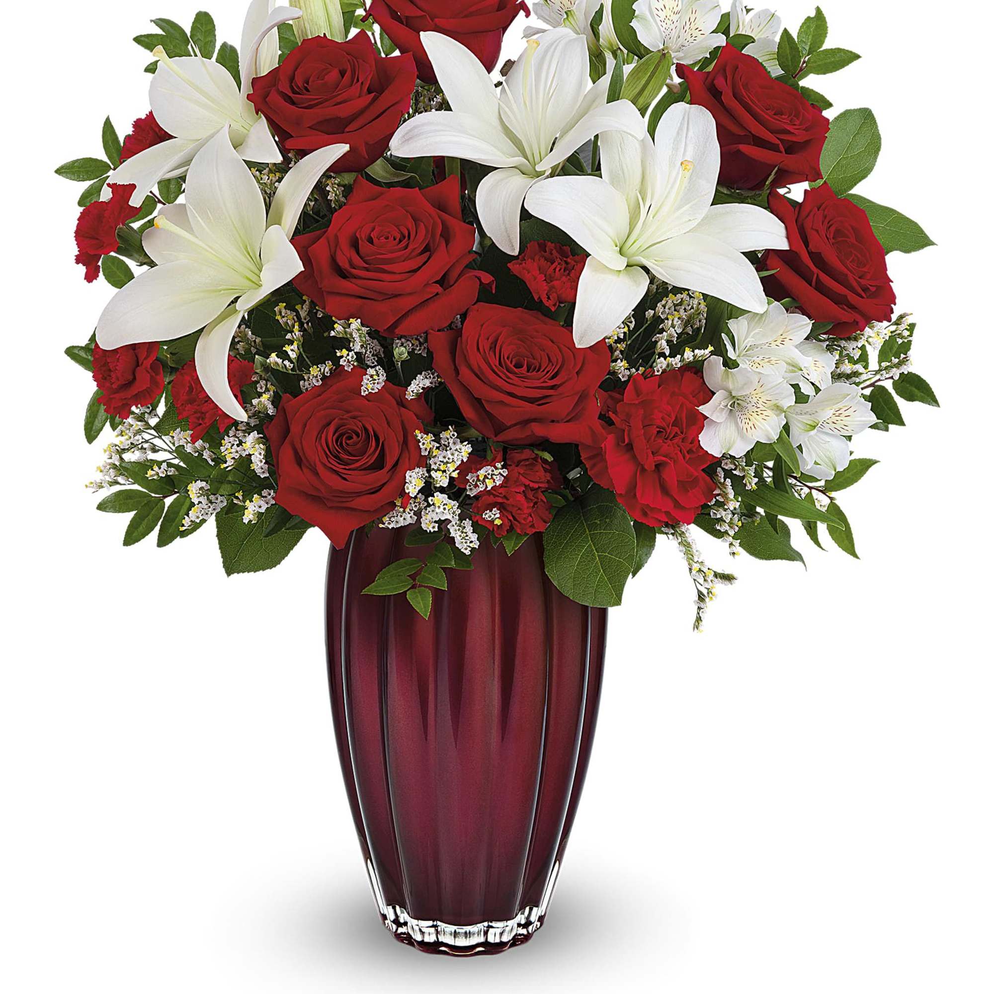 Red roses and white lilies arranged in a burgundy vase