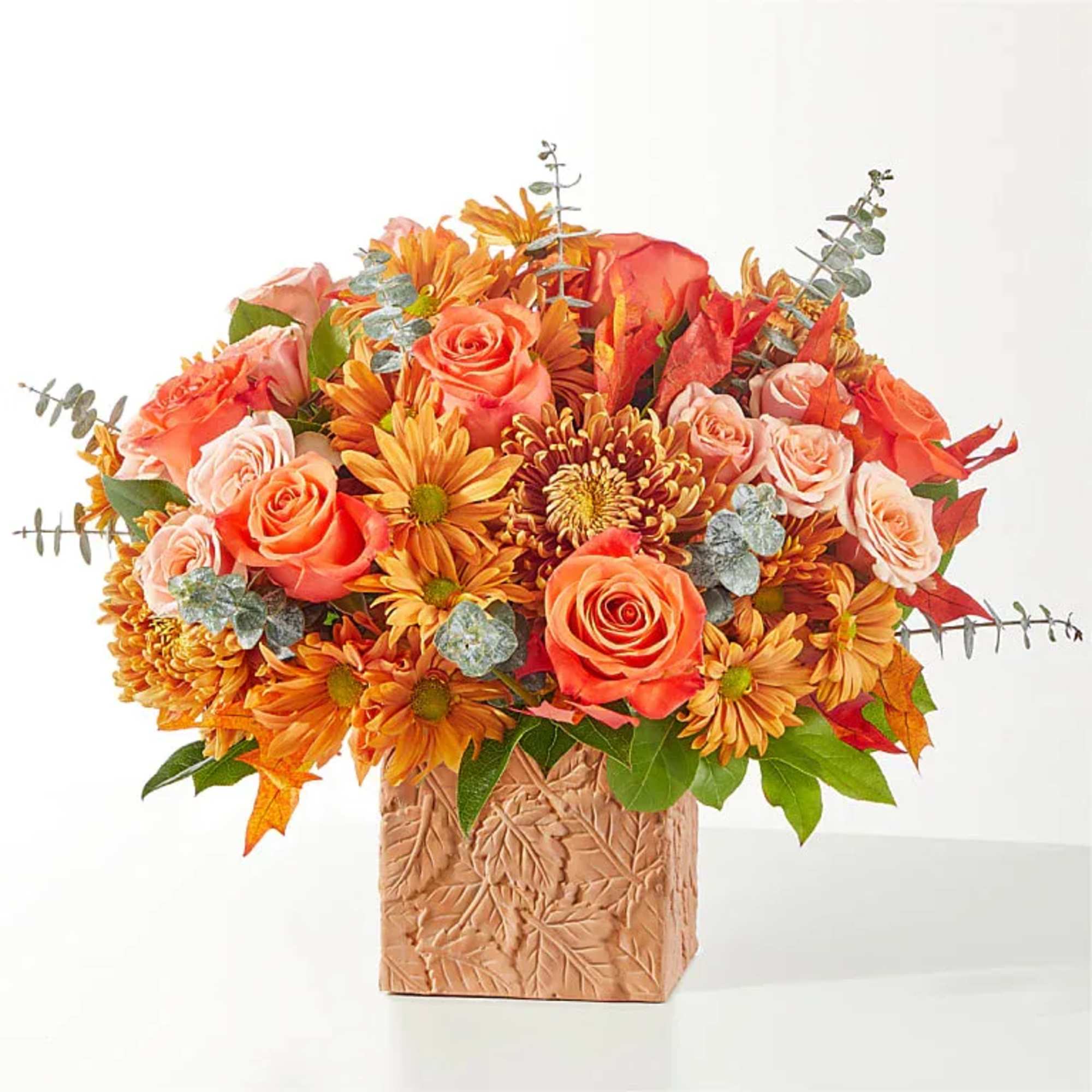 Reminiscent of taking a long drive upstate, this beautiful bouquet of orange