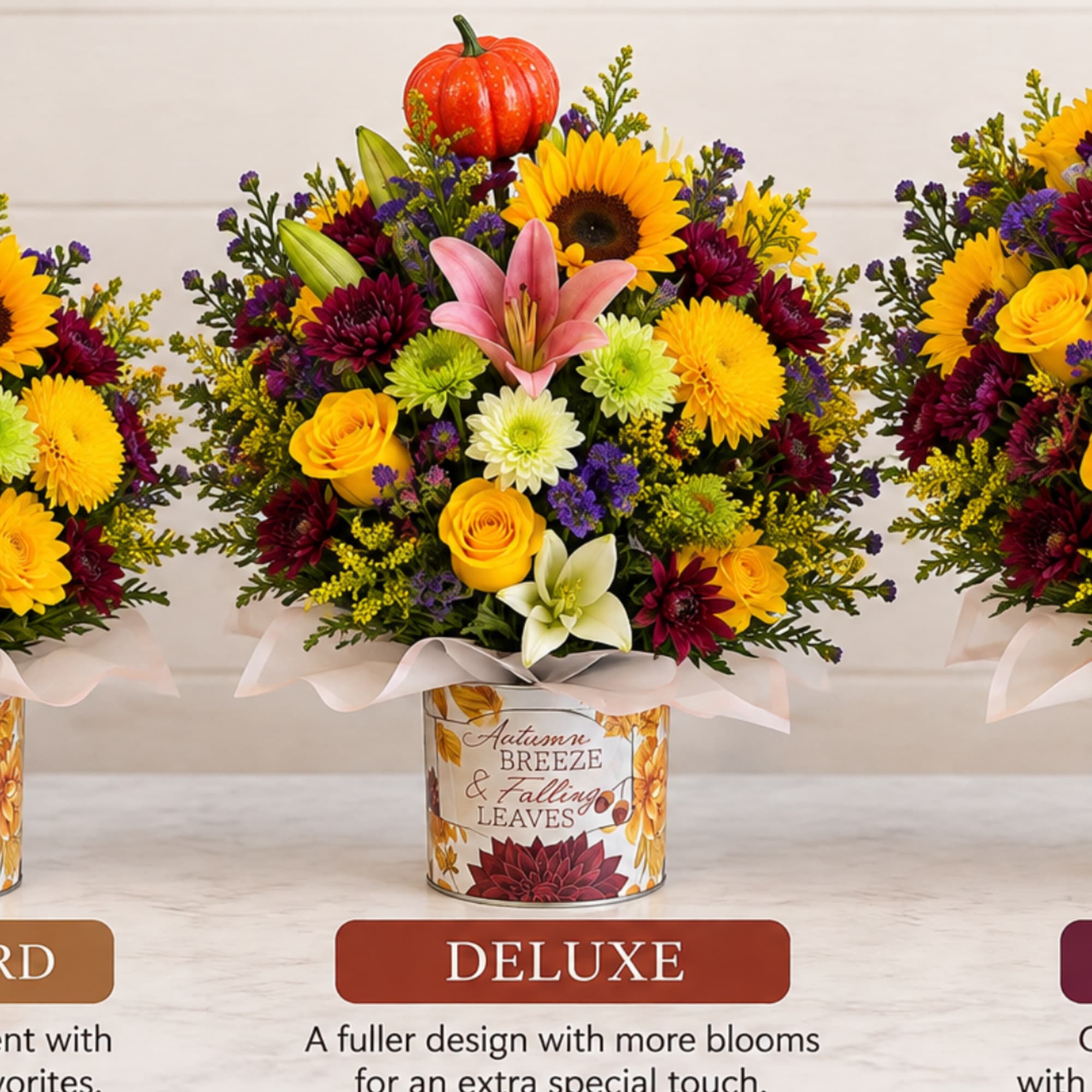 Autumn floral arrangement in a decorated tin container with a pumpkin accent