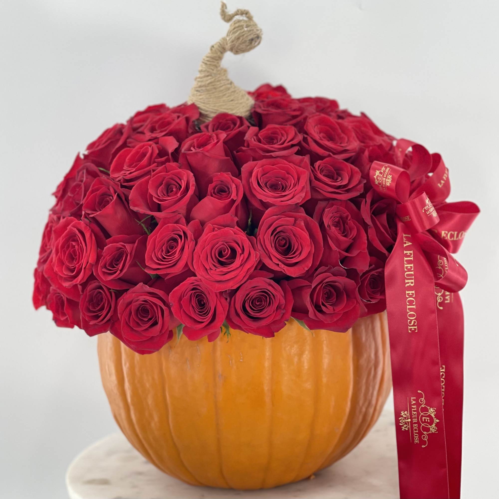 75 red roses in an pumpkin , photo 2 of 3
