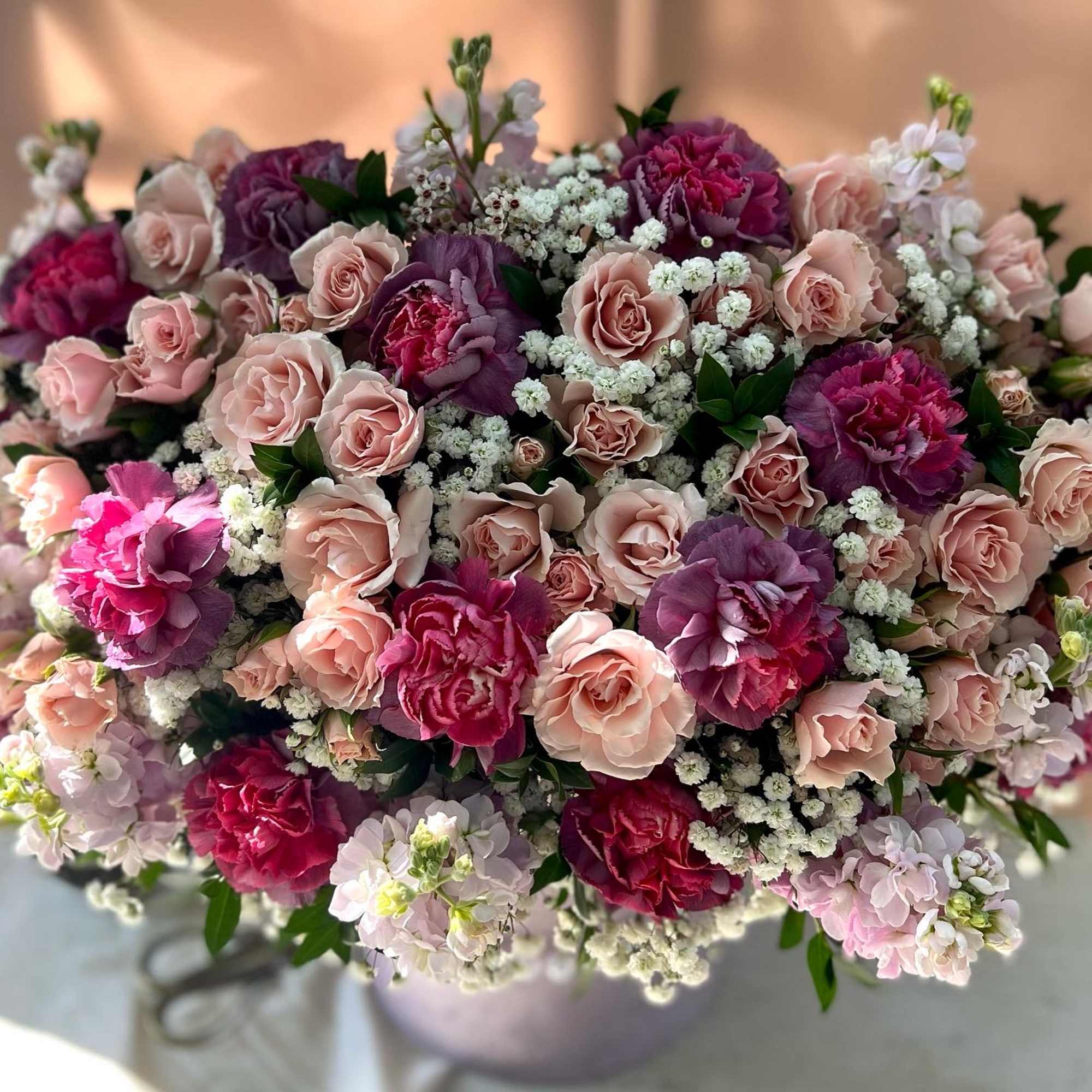 DELUXE size is shown in the picture. 
This charming arrangement showcases a, photo 2 of 2