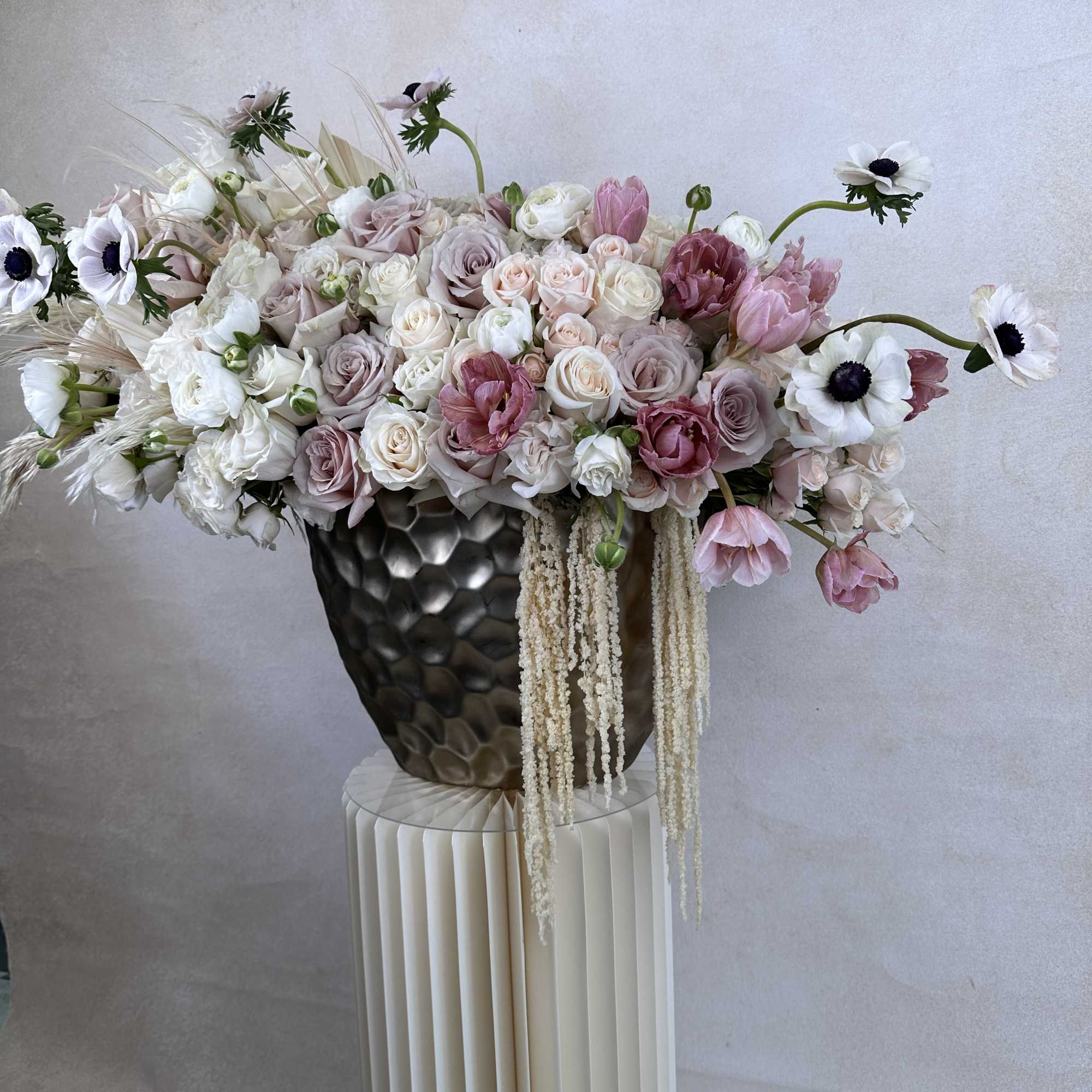 A stylish fusion of fresh, high-end flowers designed in a statement vase., photo 2 of 2