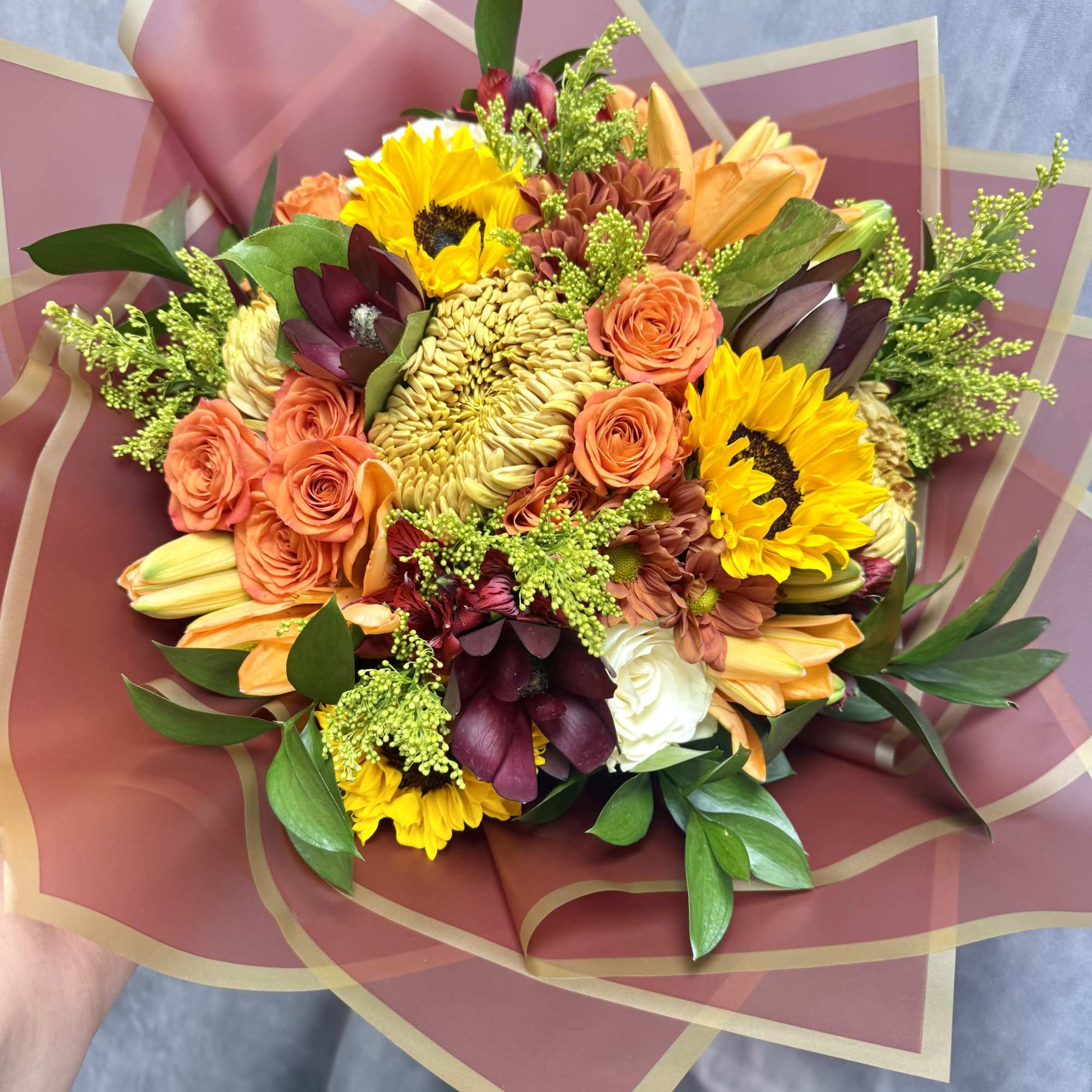Golden Fall Blooms &mdash; A rich and vibrant bouquet featuring orange lilies
