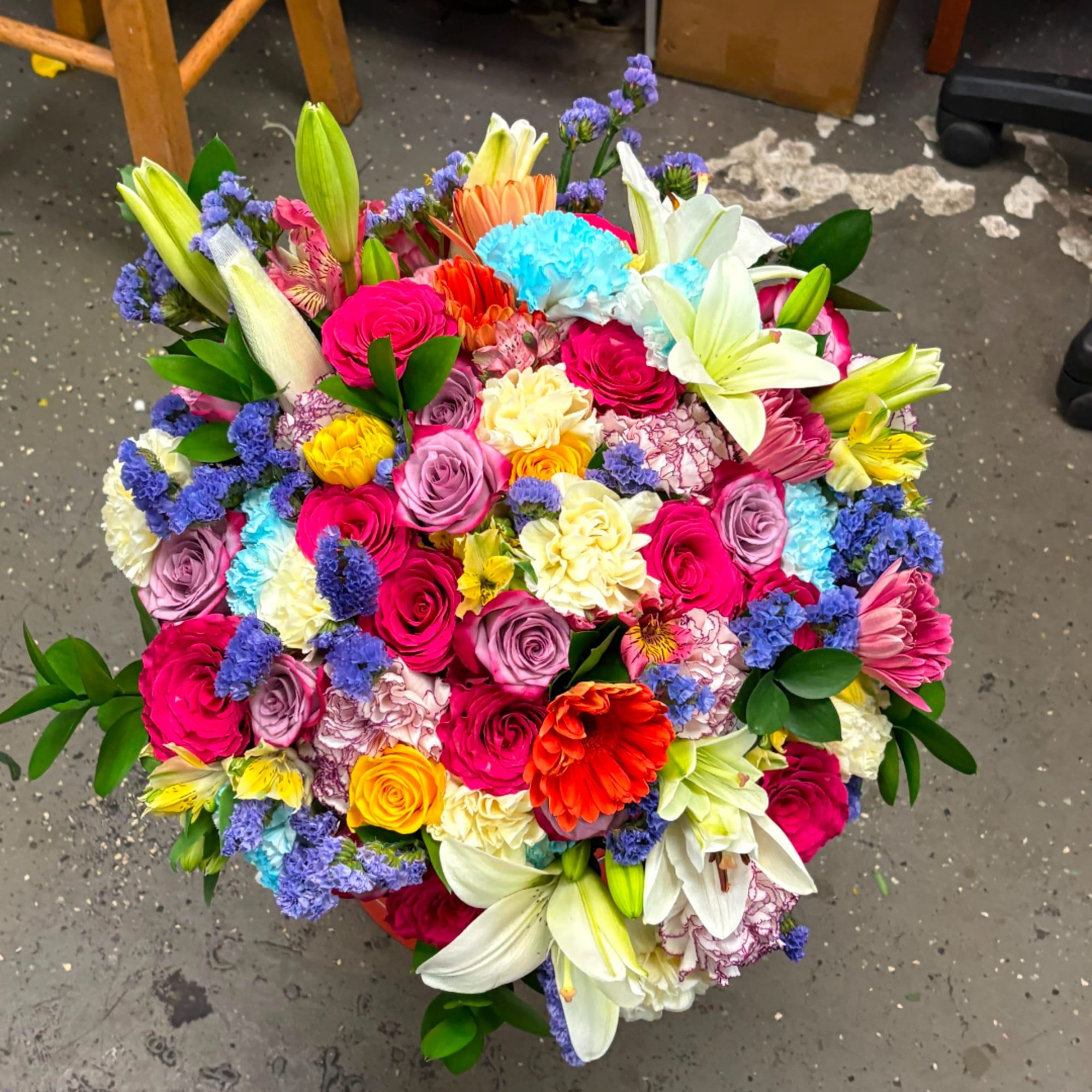 Colorful bouquet with roses, lilies, and carnations