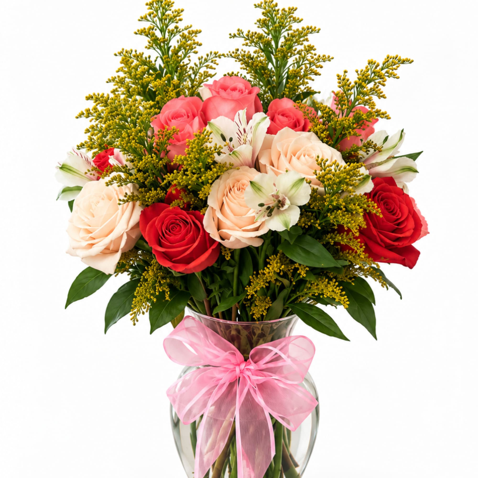 Bouquet of pink, red, and peach roses in a glass vase with a pink bow