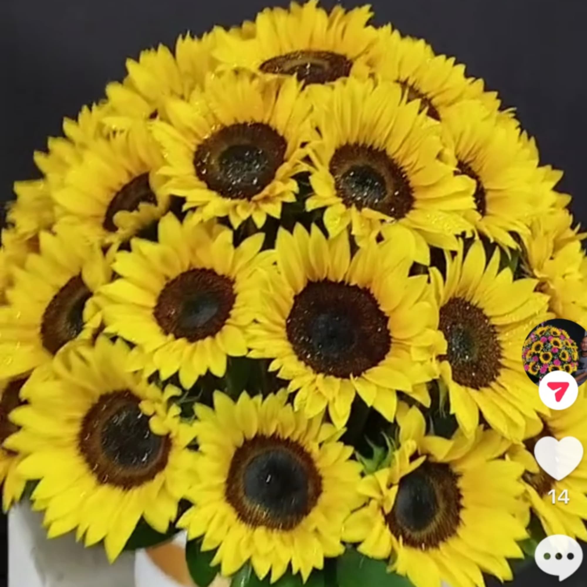 Bouquet of bright yellow sunflowers with dark centers