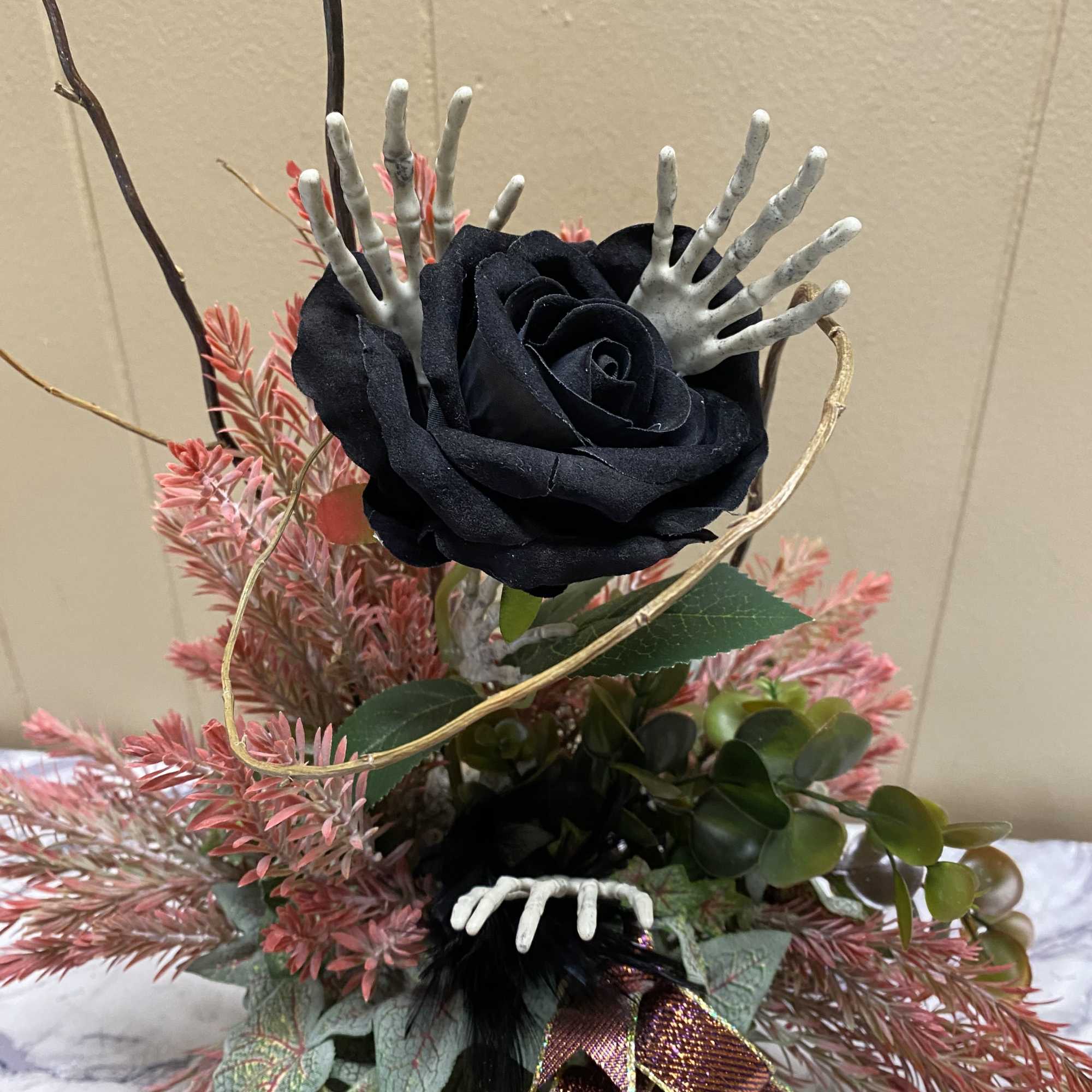 A bud vase filled with a silk black rose and filled with, photo 2 of 2