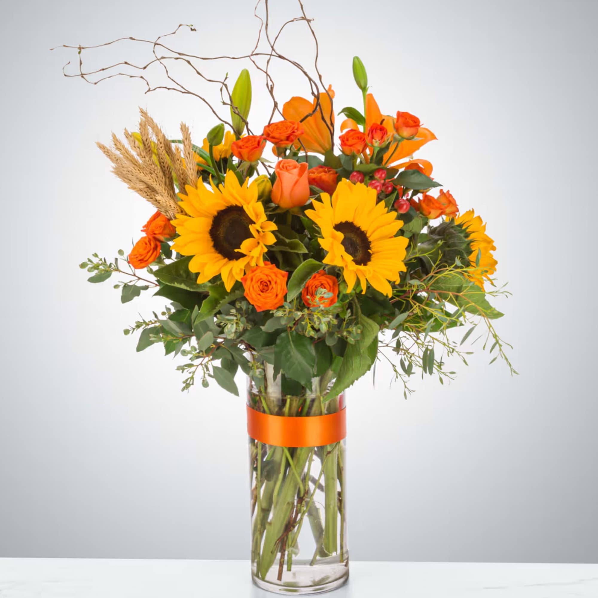 The ultimate fall flower mix featuring sunflowers and a variety of orange