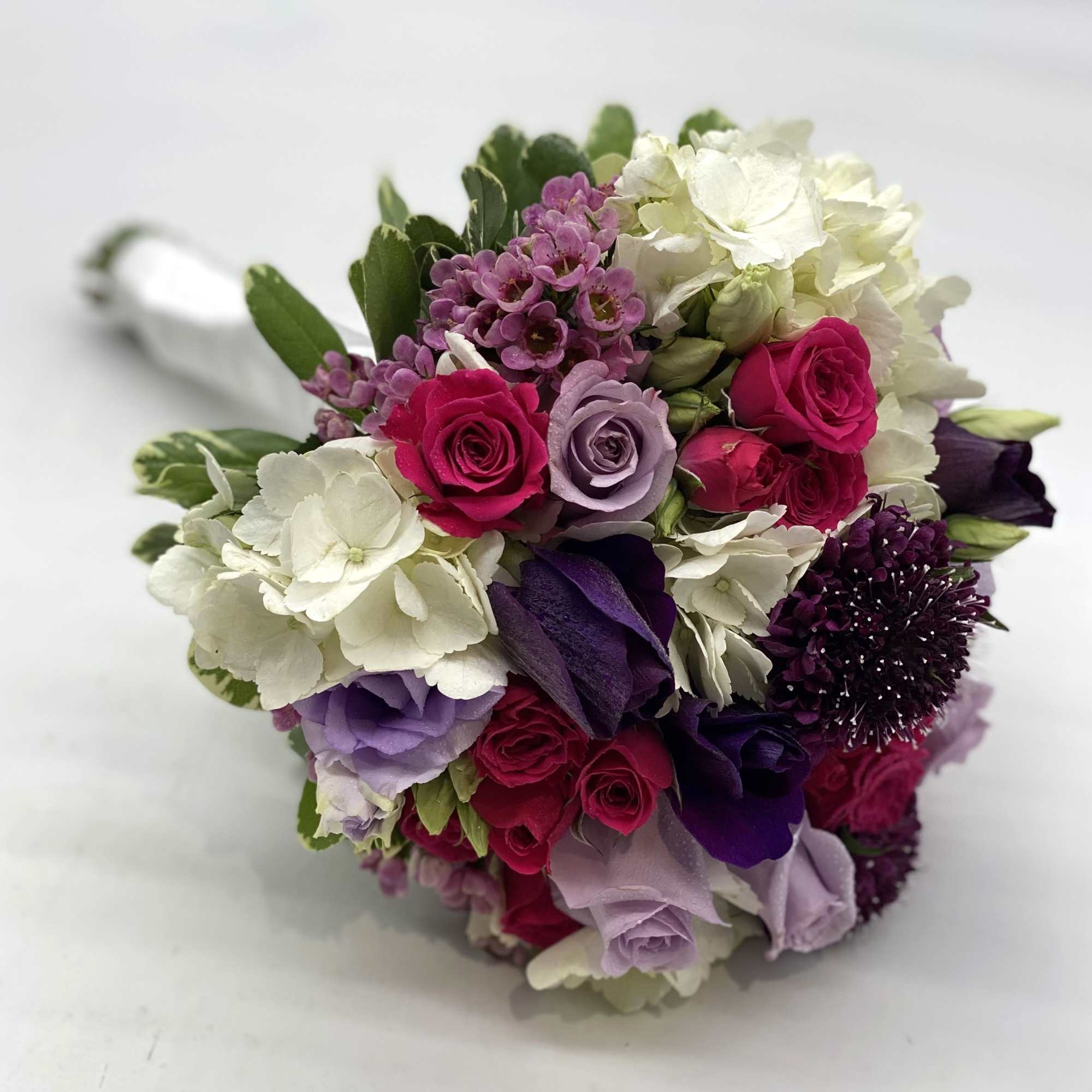 Whites, Deep Purple, Lavendar &amp; Hot Pink make this bouquet one of