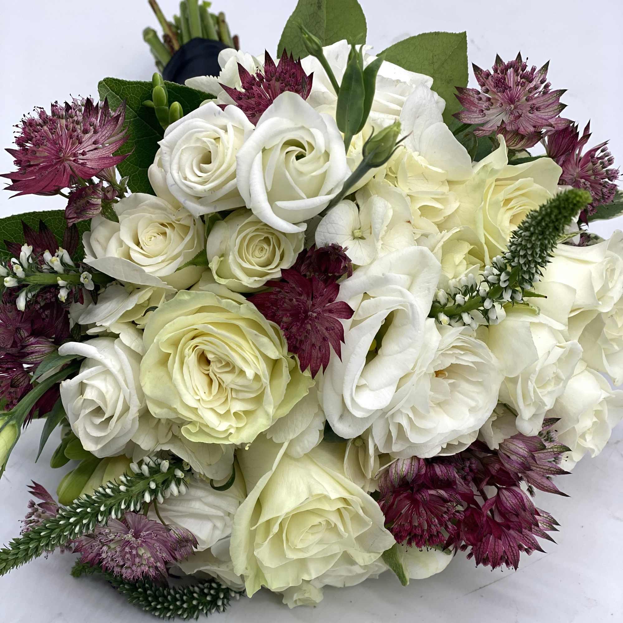 A nice mix of whites with pops of deep purple/burgundy tones!, photo 2 of 3