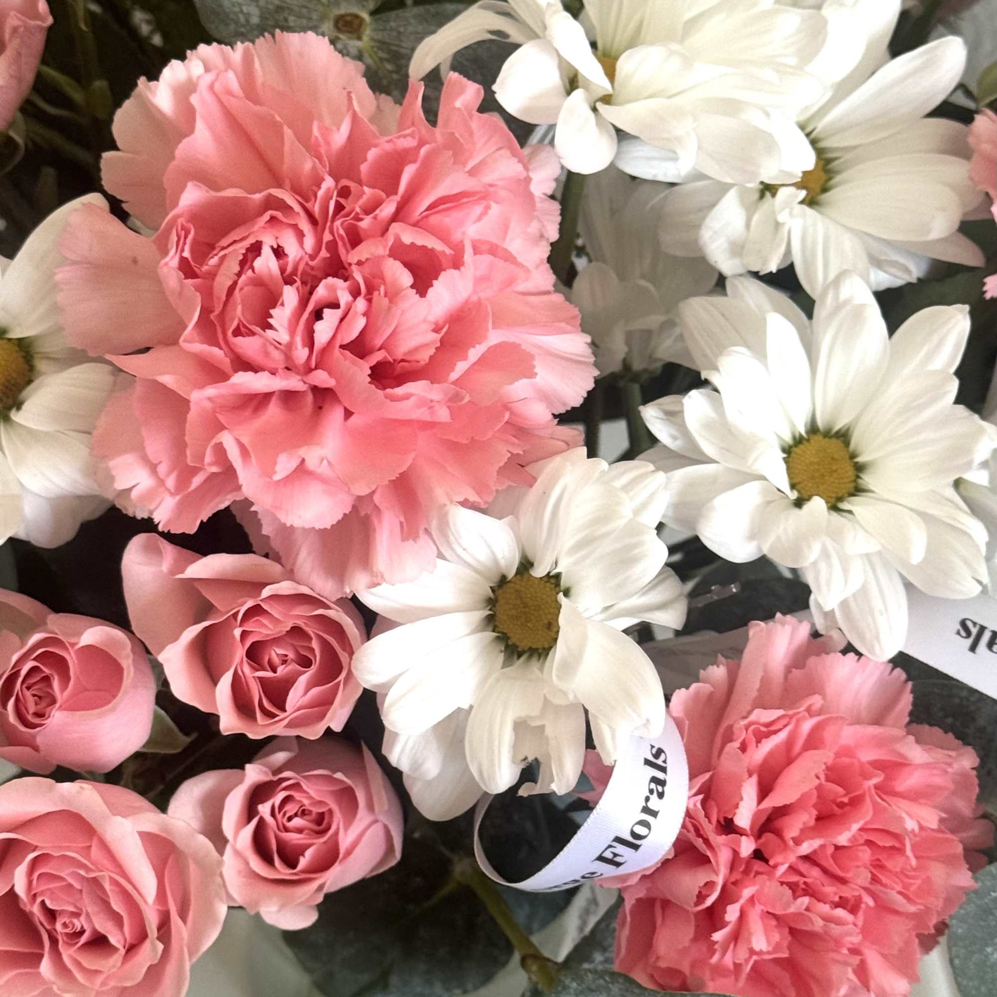 Nice and cute arrangement in a plastic vase., photo 2 of 2