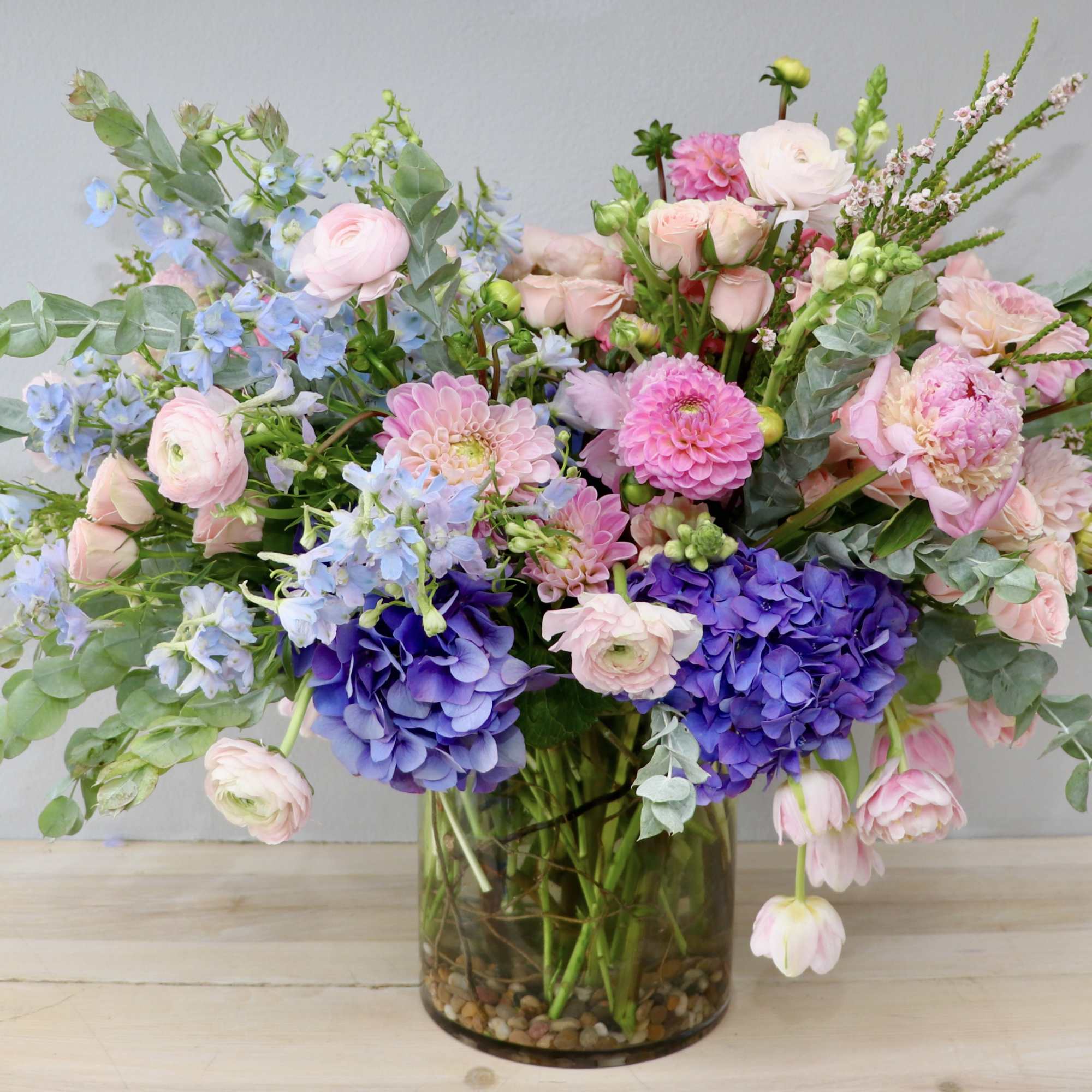 Mixed pastel bouquet in a glass vase