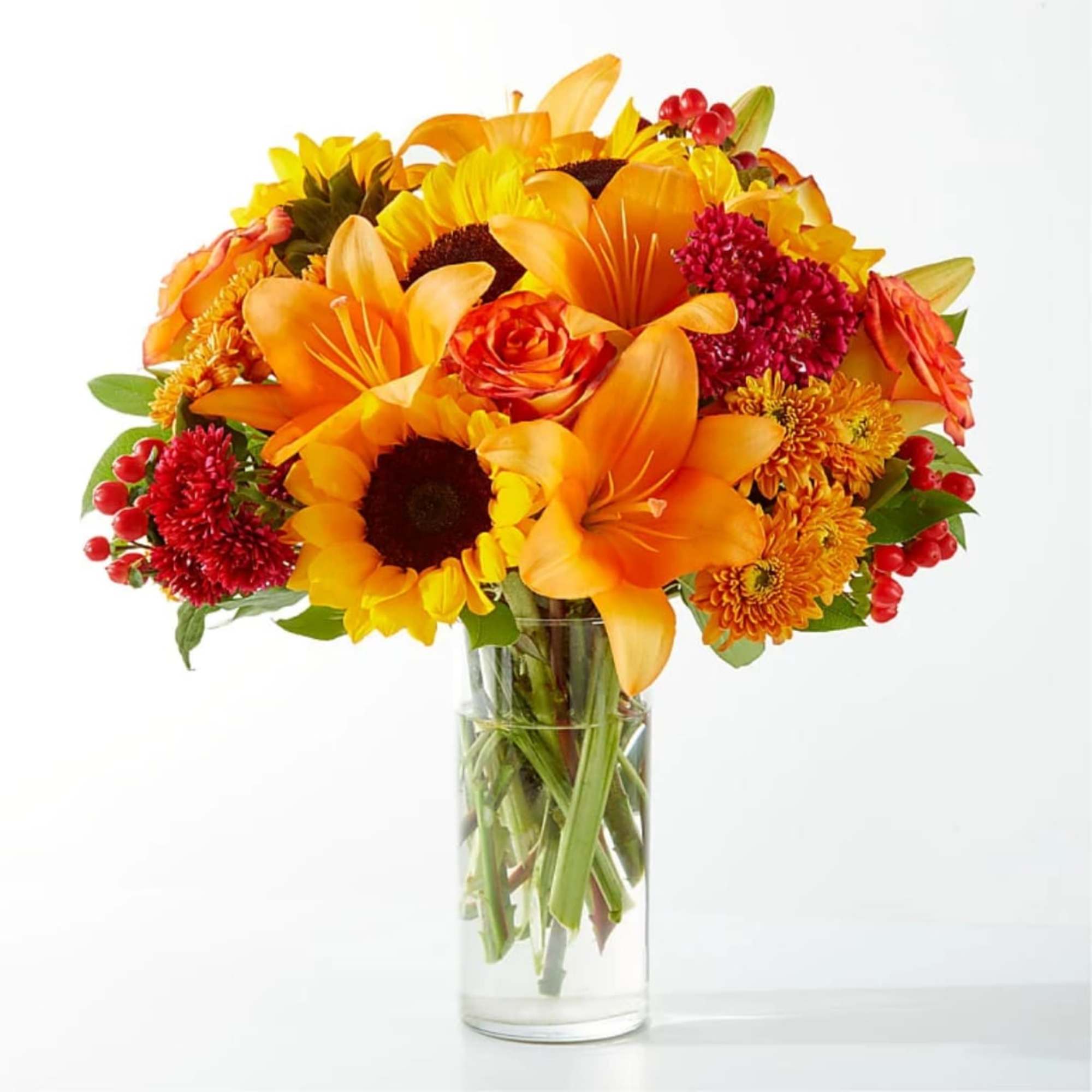 A bold burst of autumn color-bright sunflowers, orange roses, golden and red, photo 2 of 3