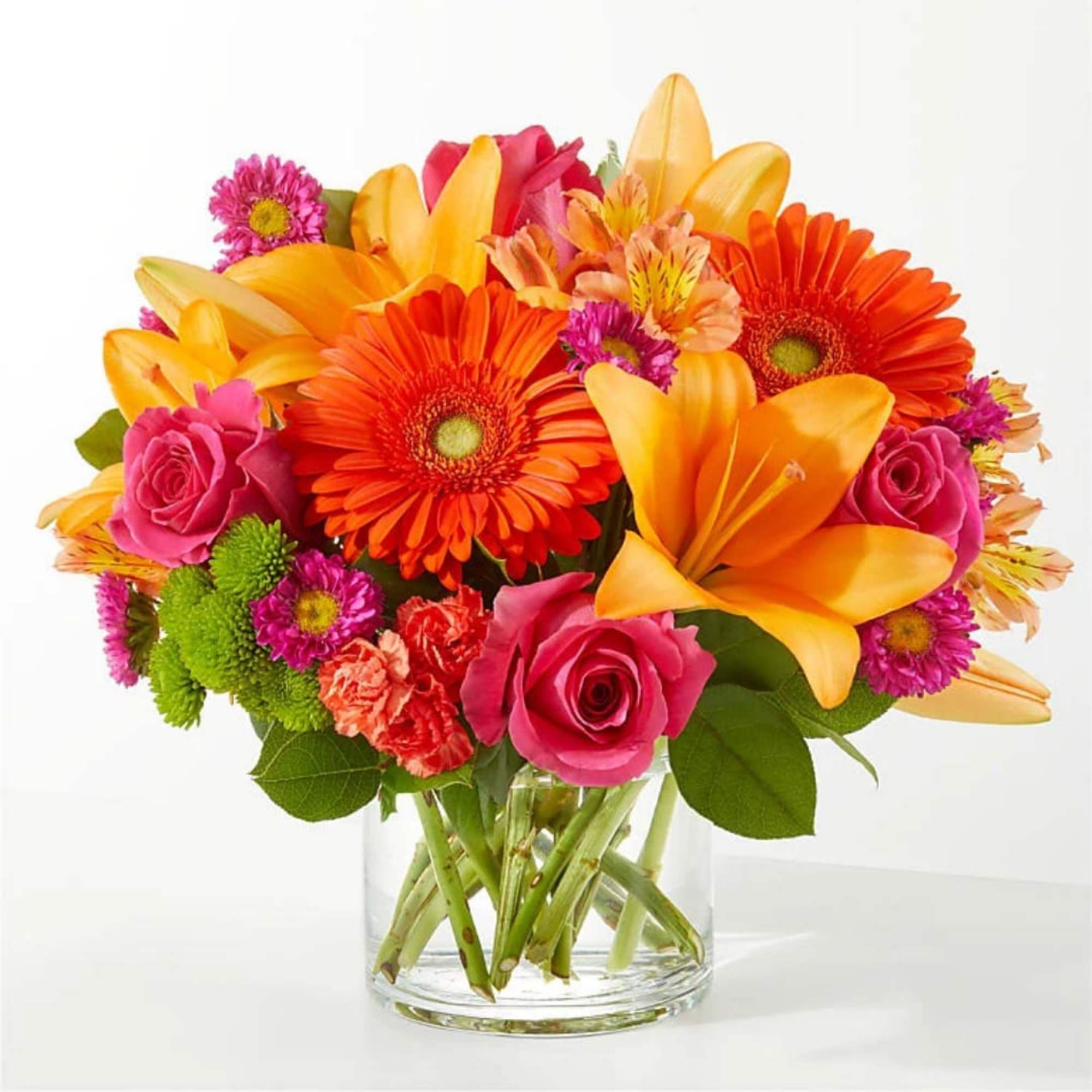 Bright, compact, and joyfully colorful-the Soiree Bouquet is a mixed-color flower arrangement