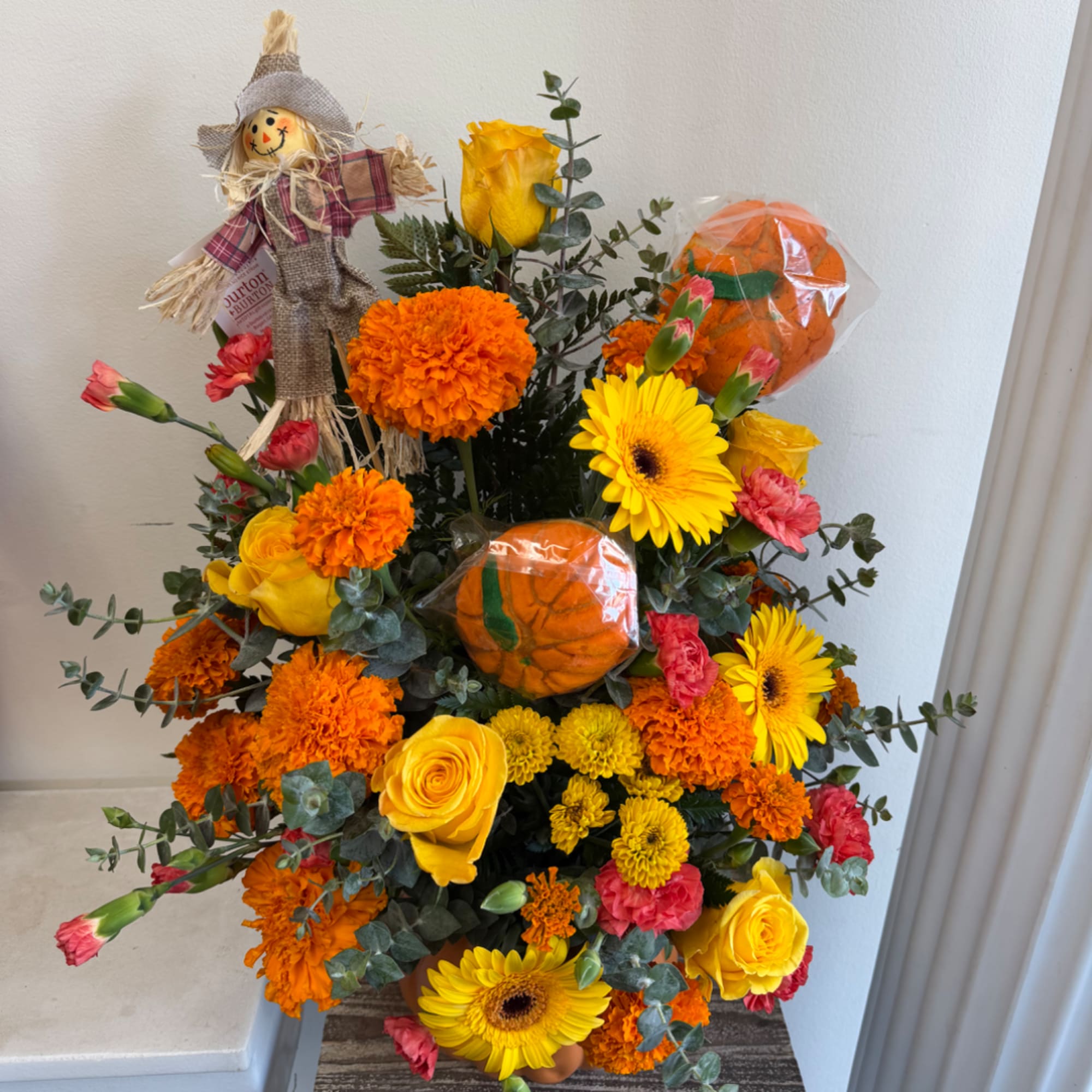 Bright mixed bouquet with yellow roses, gerbera daisies, and orange marigolds, photo 2 of 4