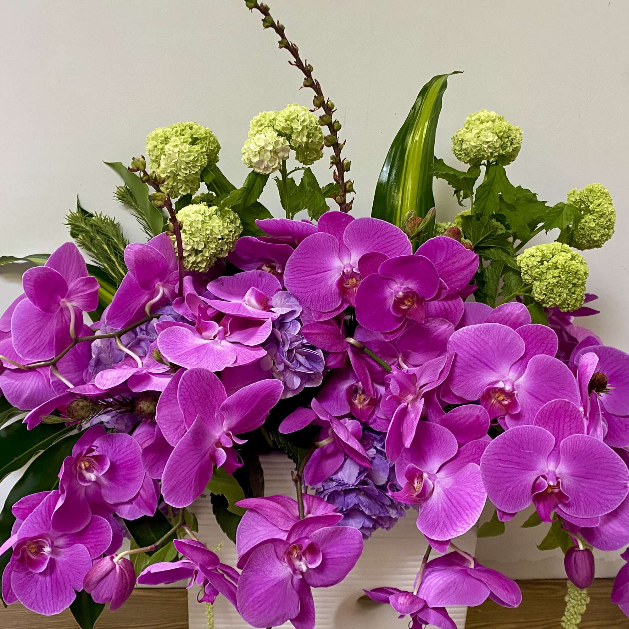 In a beautiful ceramic pot, combination of purple, hydrogen and purple orchids, photo 3 of 3