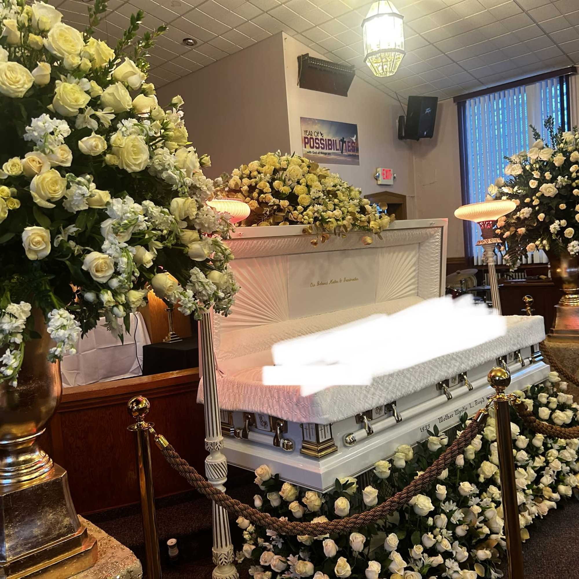 Casket spray,floor arrangement and 2 big side arrangements 