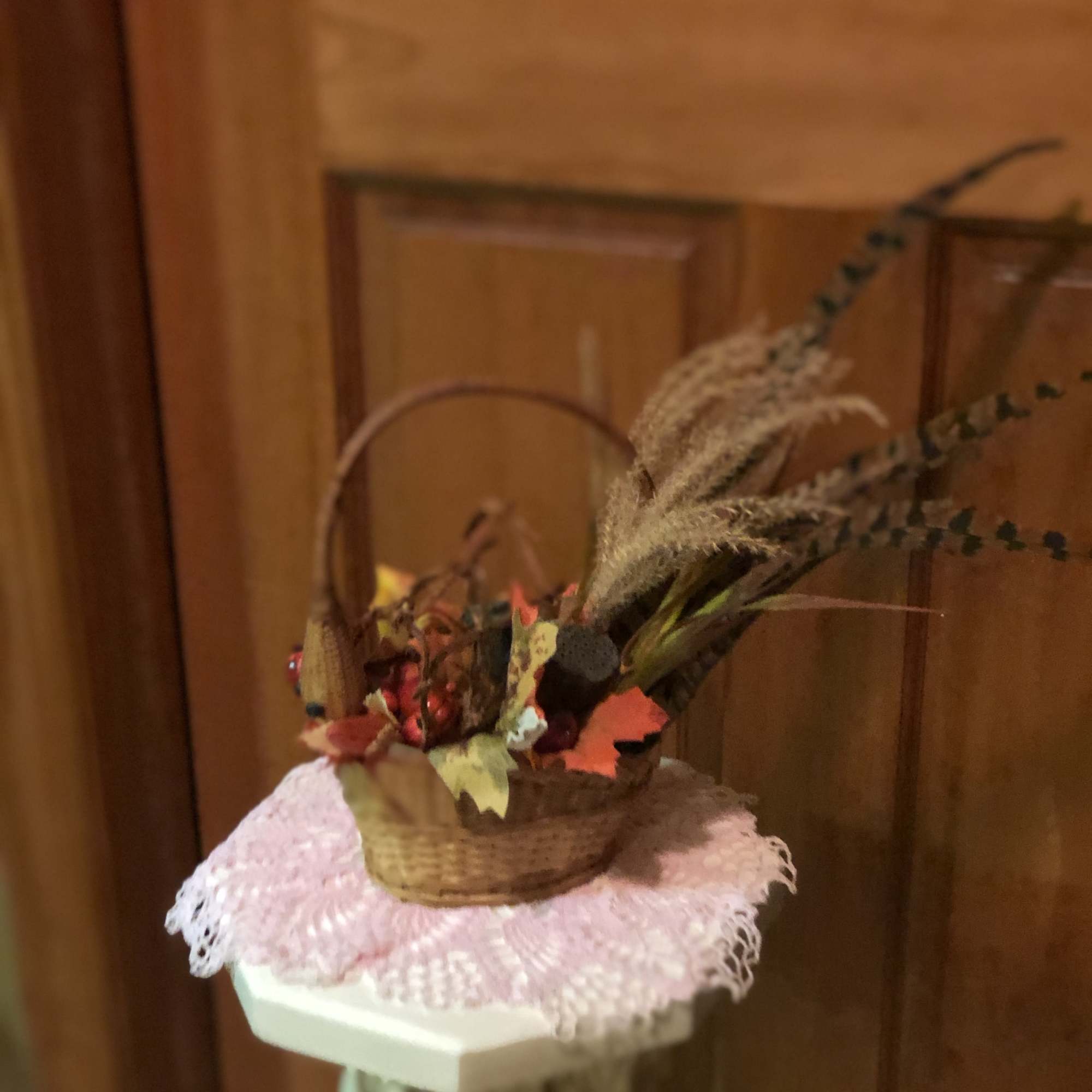One of a kind creation of a pheasant hiding his head in, photo 2 of 2