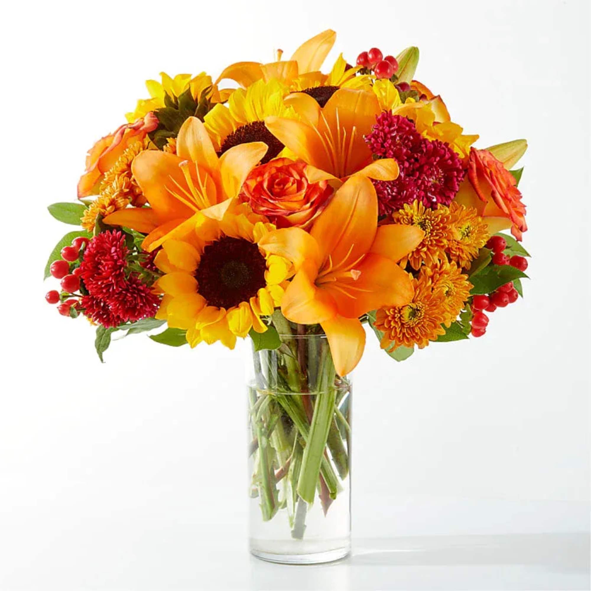Capturing the beauty of the season, the Harvest Hues Bouquet brings all