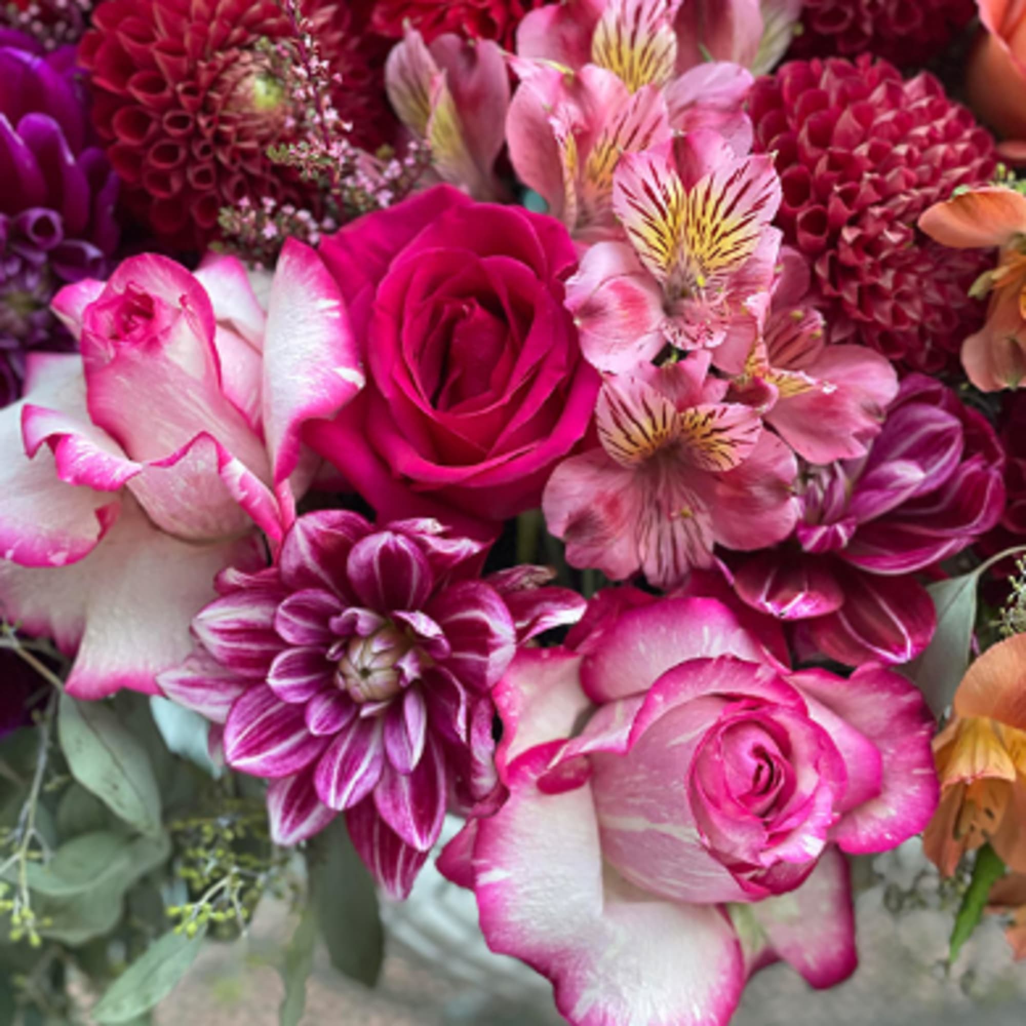 Pink and white roses with magenta dahlias and pink alstroemeria