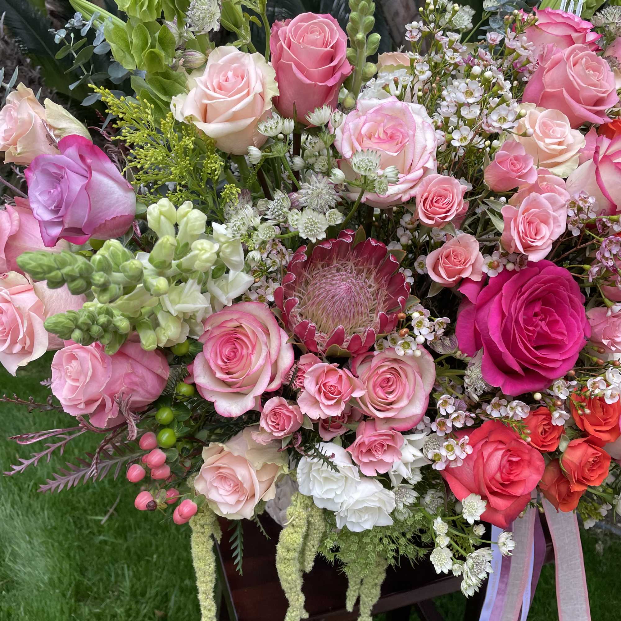 Large bouquet of pink and white roses with mixed blooms