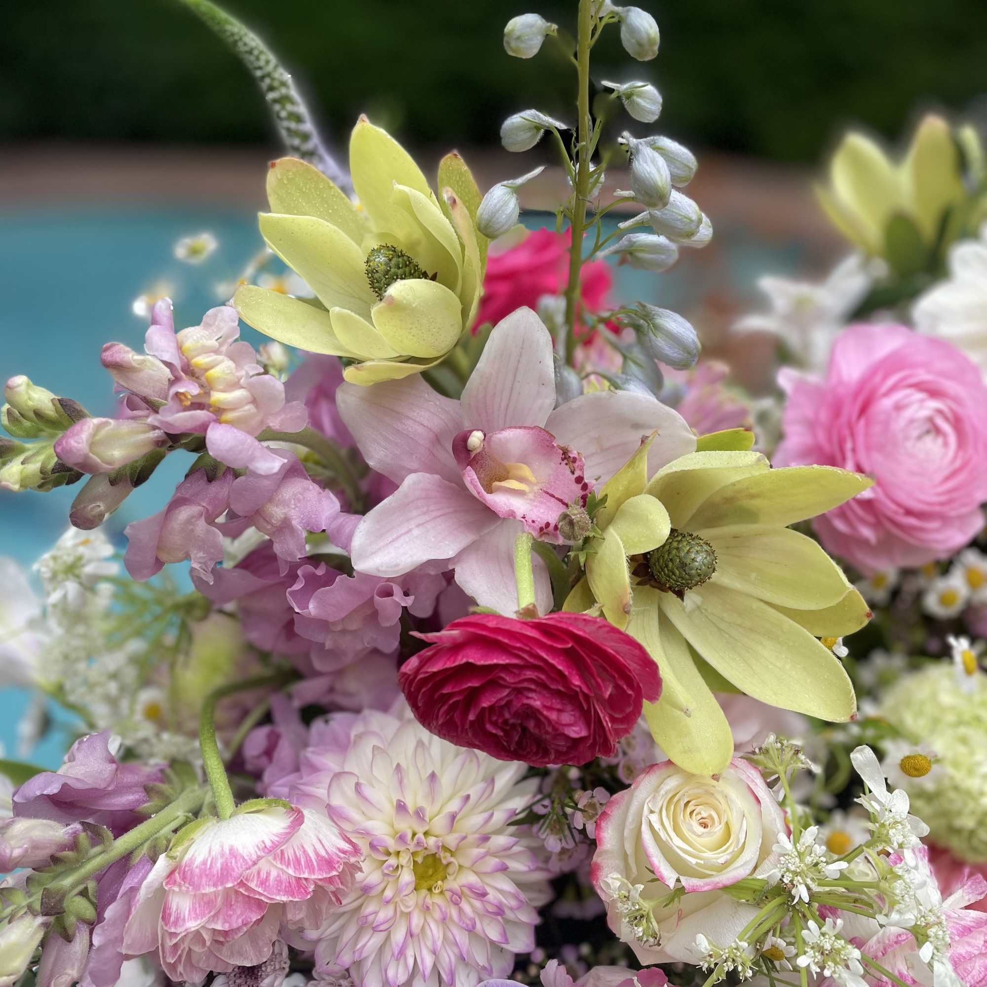 Mixed bouquet with pink, yellow, and lavender flowers