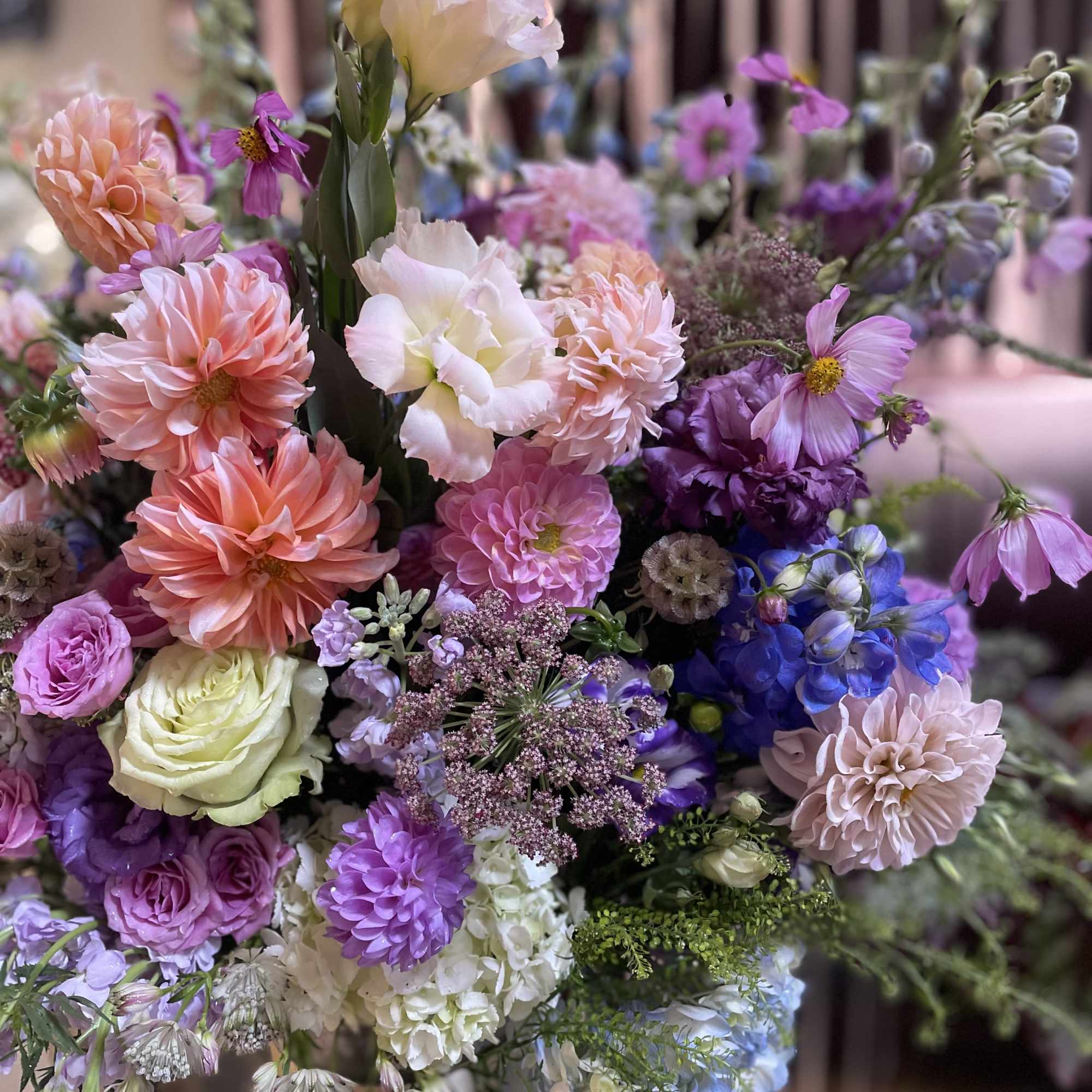 Mixed bouquet of pink, purple, and white flowers