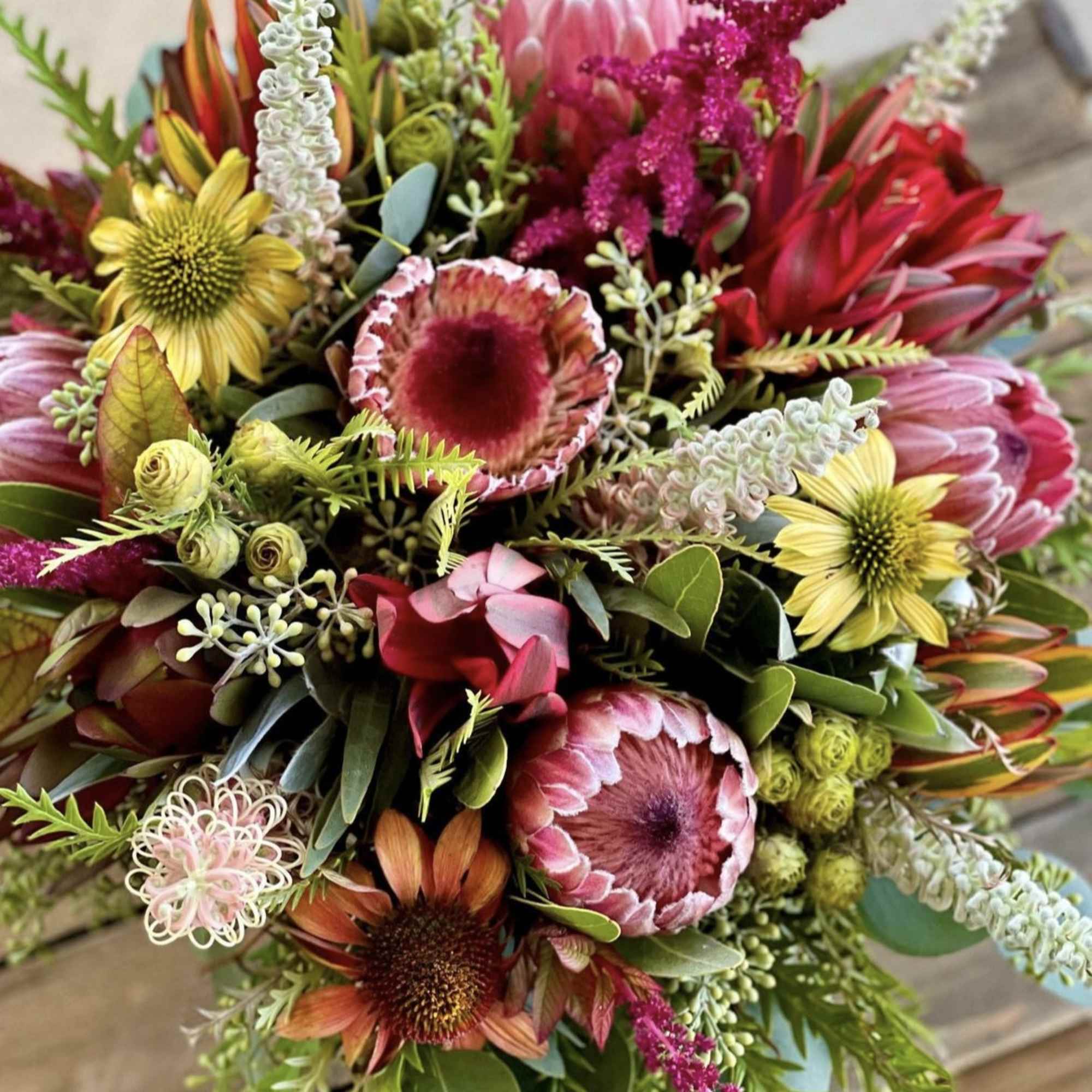 Mixed bouquet with pink, red, and yellow flowers