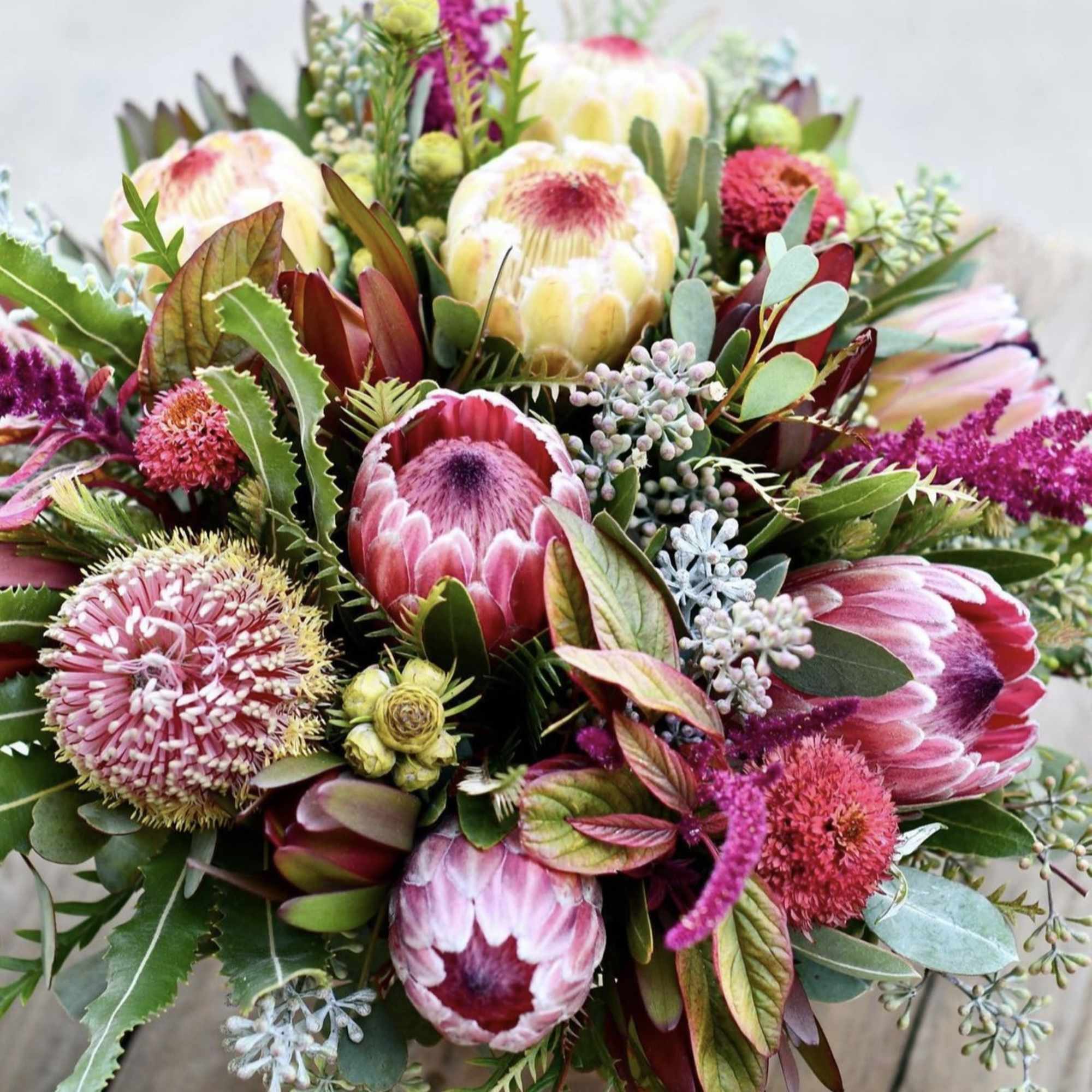 Mixed bouquet with pink protea and assorted blooms
