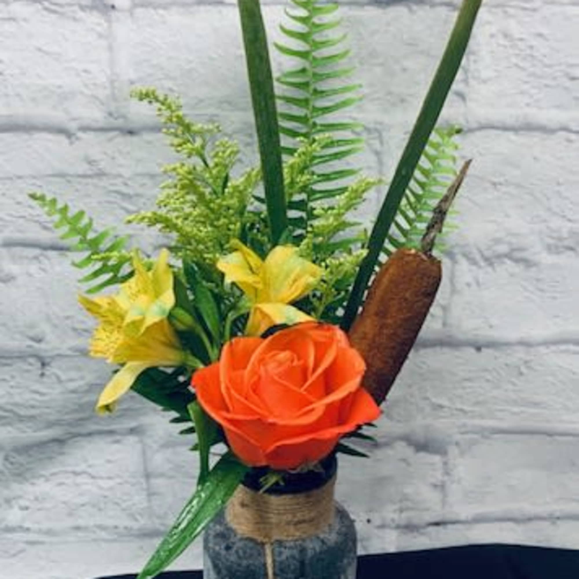 Let our designers create the perfect Fall arrangement. We just love creating, photo 2 of 3